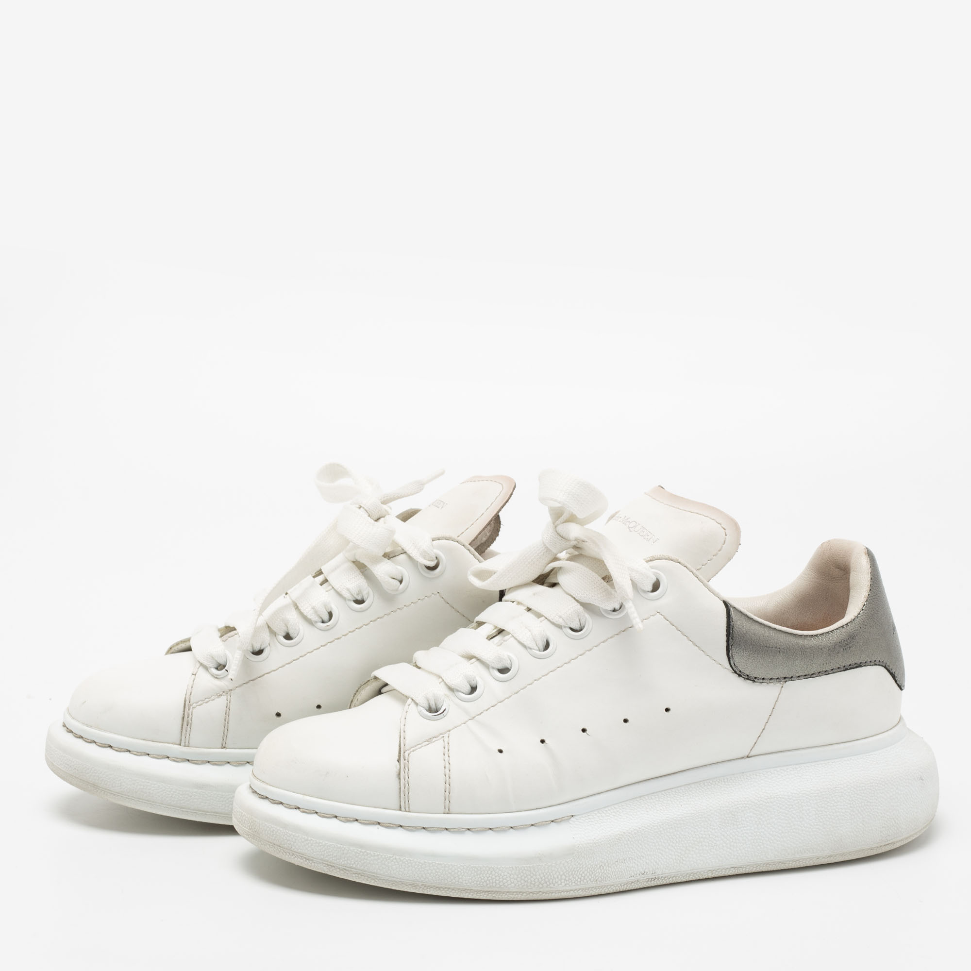 

Alexander McQueen Metallic/White Leather Oversized Sneakers Size