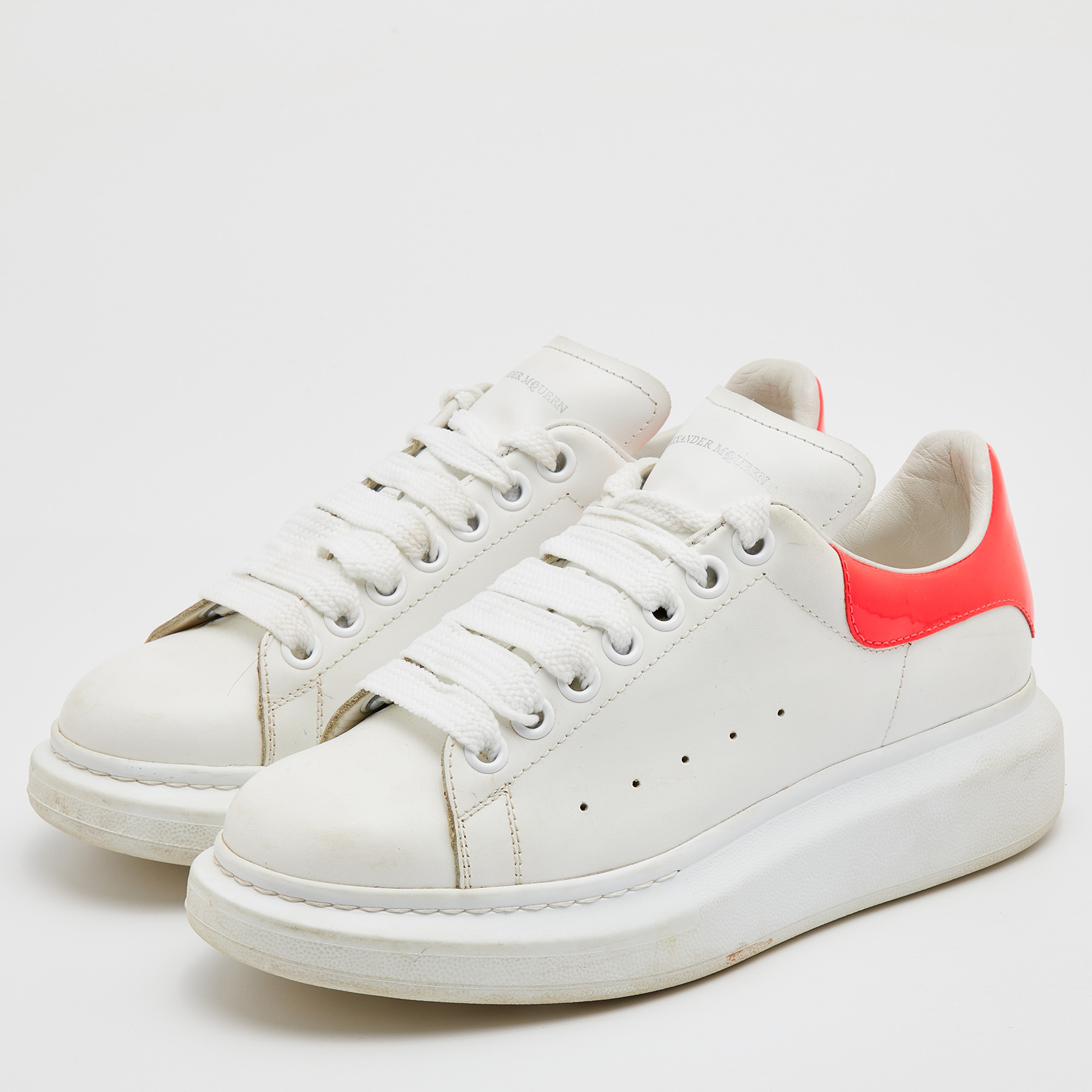 

Alexander McQueen White/Coral Leather Oversized Sneakers Size