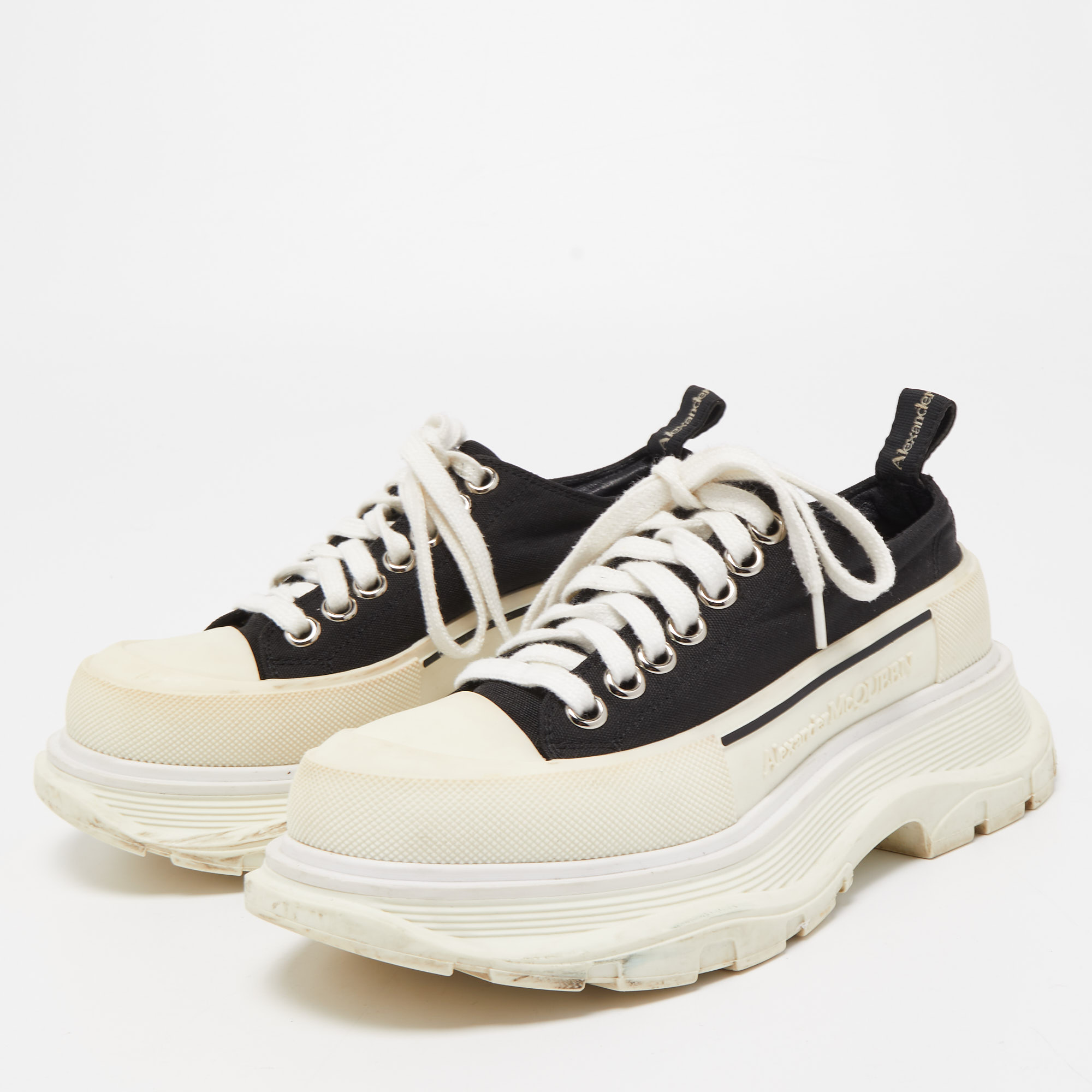 

Alexander McQueen Black / White Canvas Tread Slick Low Top Sneakers Size