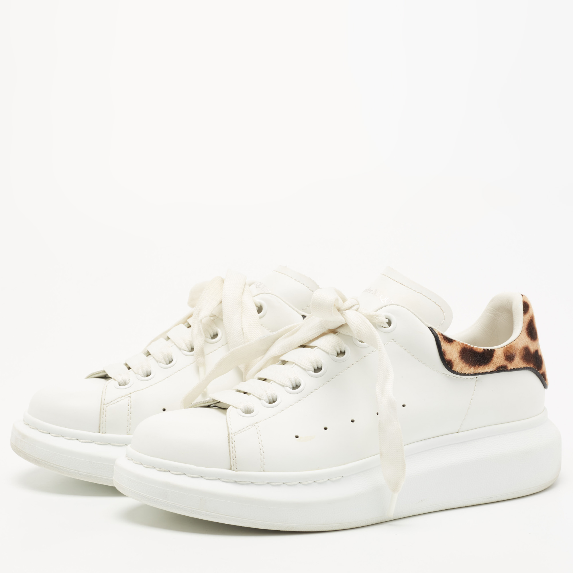 

Alexander McQueen White Leather And Leopard Print Pony Hair Low Top Sneakers Size