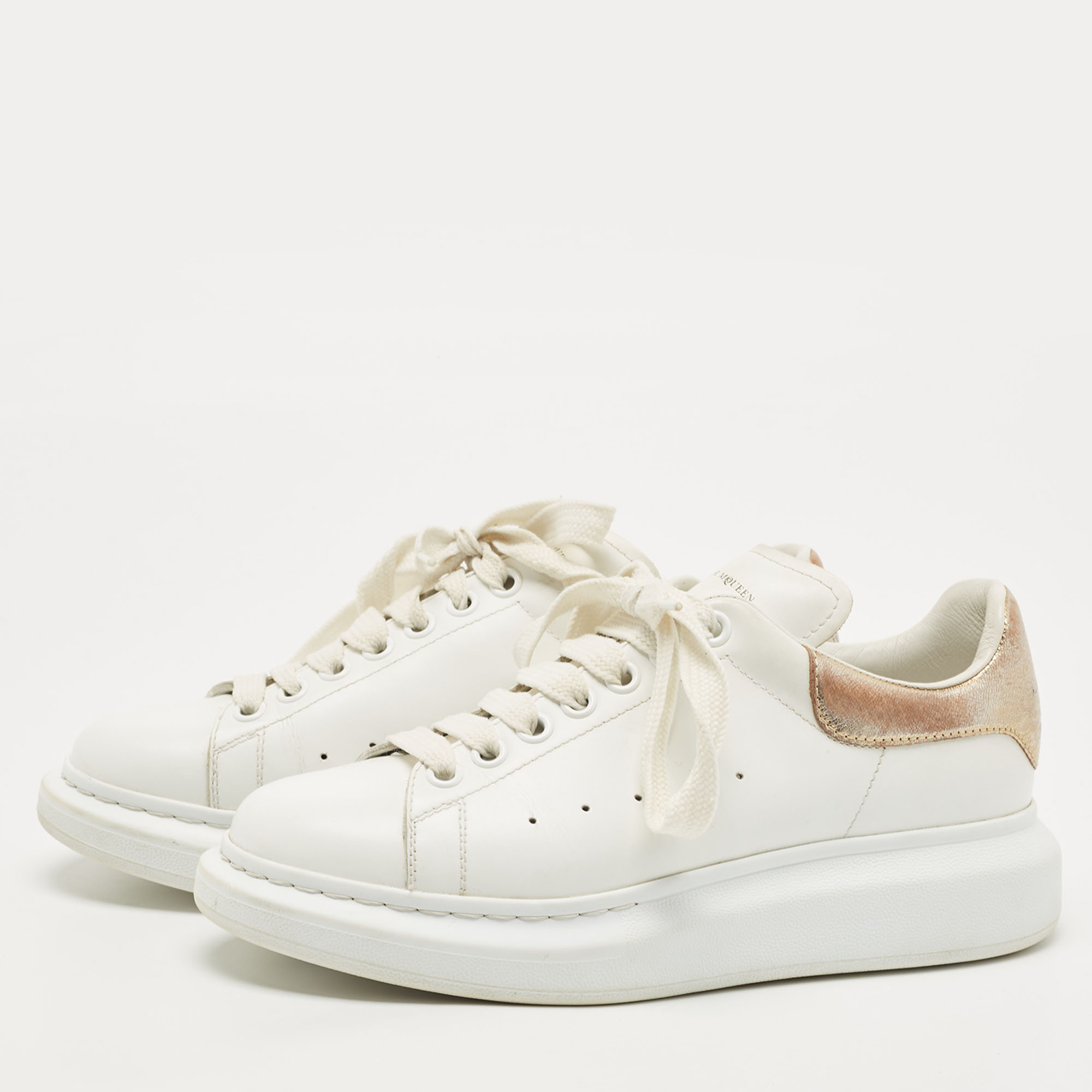 

Alexander McQueen White/Gold Leather Oversized Sneakers Size