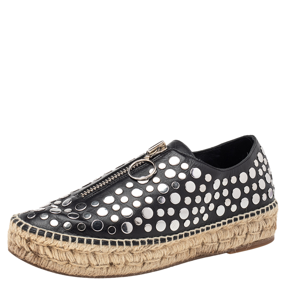 Alexander Wang shoes are known for their unique designs that emanate the labels edgy verve and immaculate craftsmanship that makes their creations last season after season. Crafted from studded leather these espadrille flats are a great combination of style and comfort.