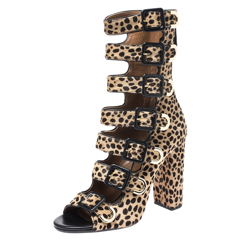 Click to view more detailed imagery on our partner's website Aquazzura Leopard Print Pony Hair Tutto Buckle Zip Up Open Toe Sandals Size 37 In Brown