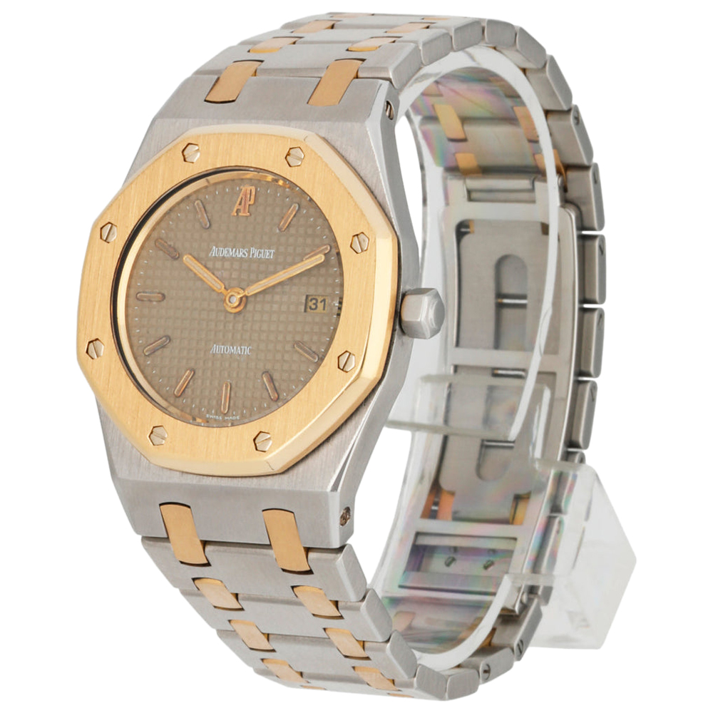 

Audemars Piguet Champagne 18k Yellow Gold And Stainless Steel Royal Oak 14470SA Women's Wristwatch 31 MM