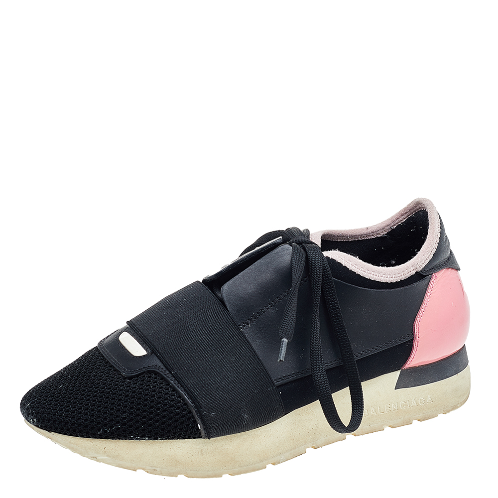Sport a trendy look as you flaunt these Race Runner sneakers from Balenciaga. They are made from black pink mesh and leather into a sturdy shape. Their vamps feature patent leather trims and a lace up fastening. Update your collection with these sneakers.