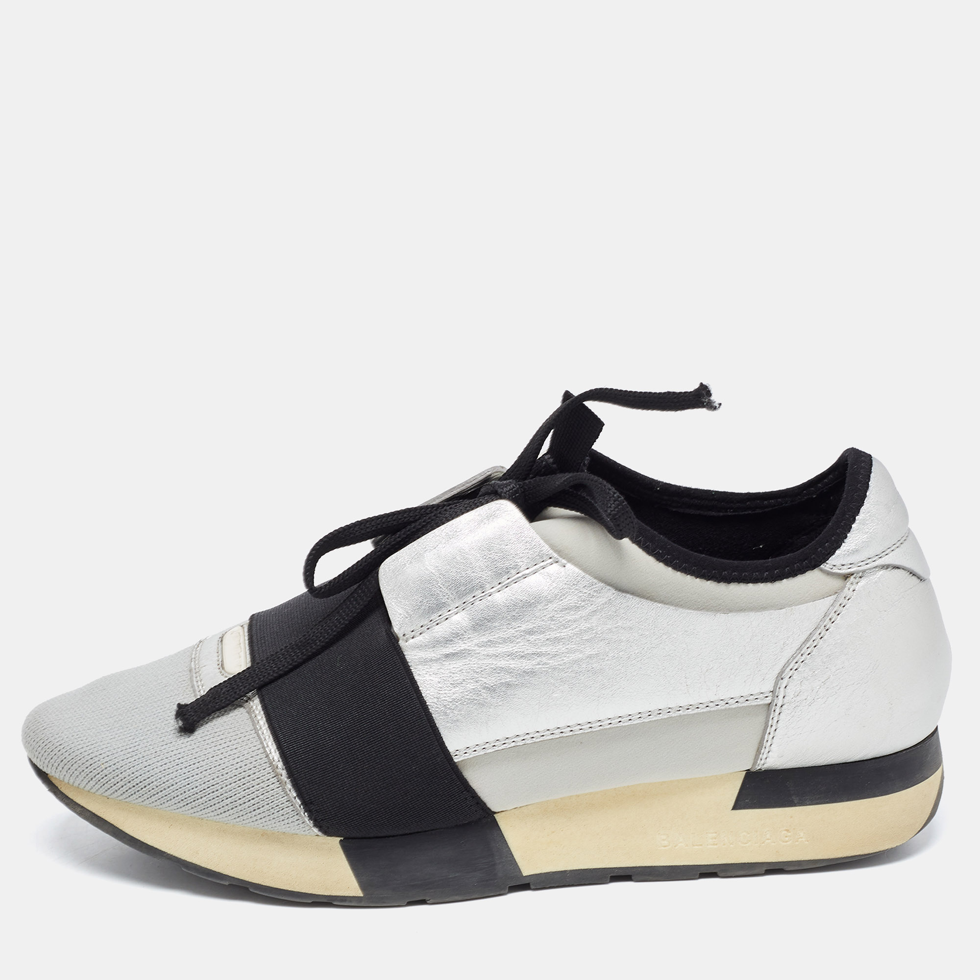 The Balenciaga Race Runner sneakers have been crafted from quality materials and feature a chic silhouette. They flaunt covered toes strap detailing on the vamps and tie up fastenings. They are complete with a leather lined insole and a tough base to provide maximum comfort when walking. The sneakers are perfect for a fun day out with friends.