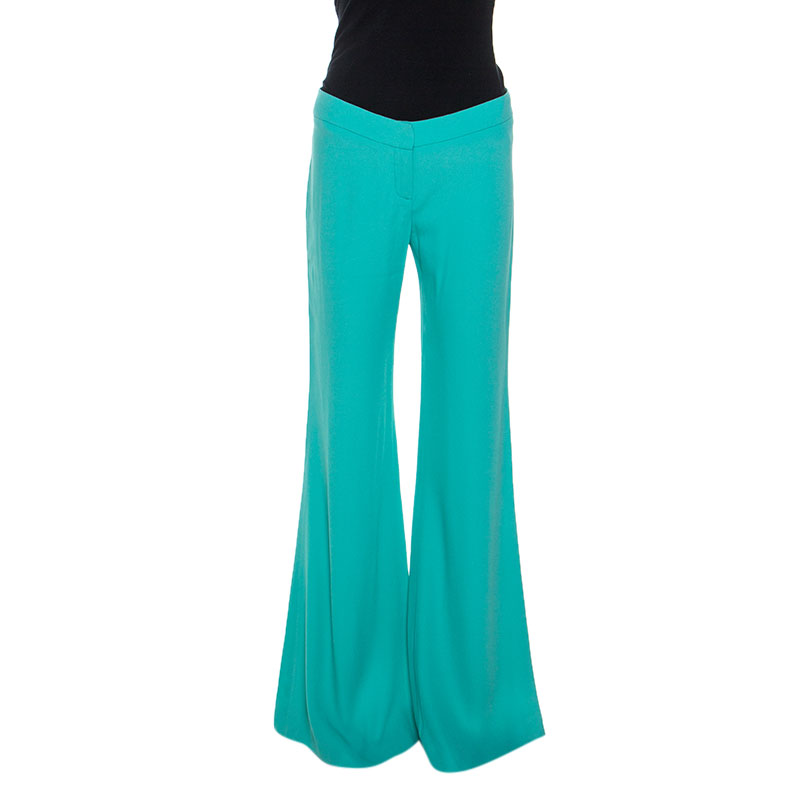 green flared trousers