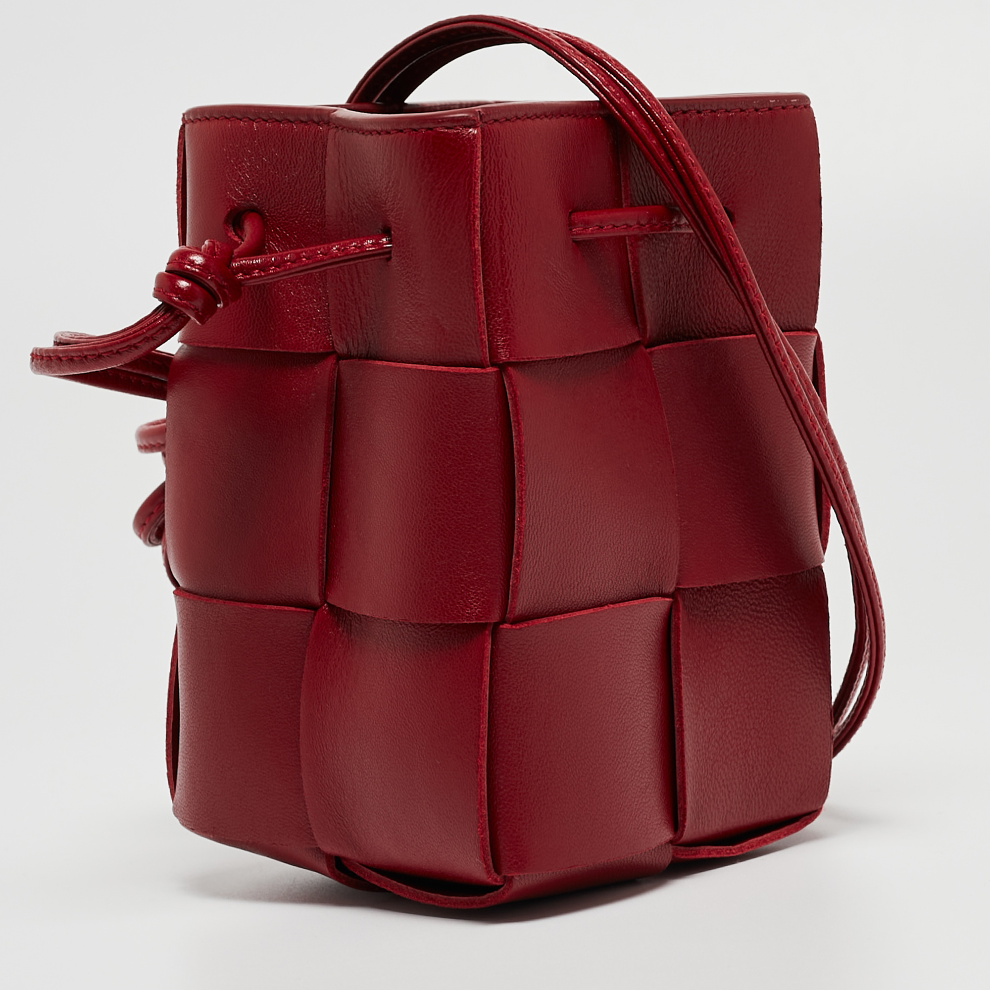 

Bottega Veneta Red Intrecciato Leather Mini Cassette Bucket Bag