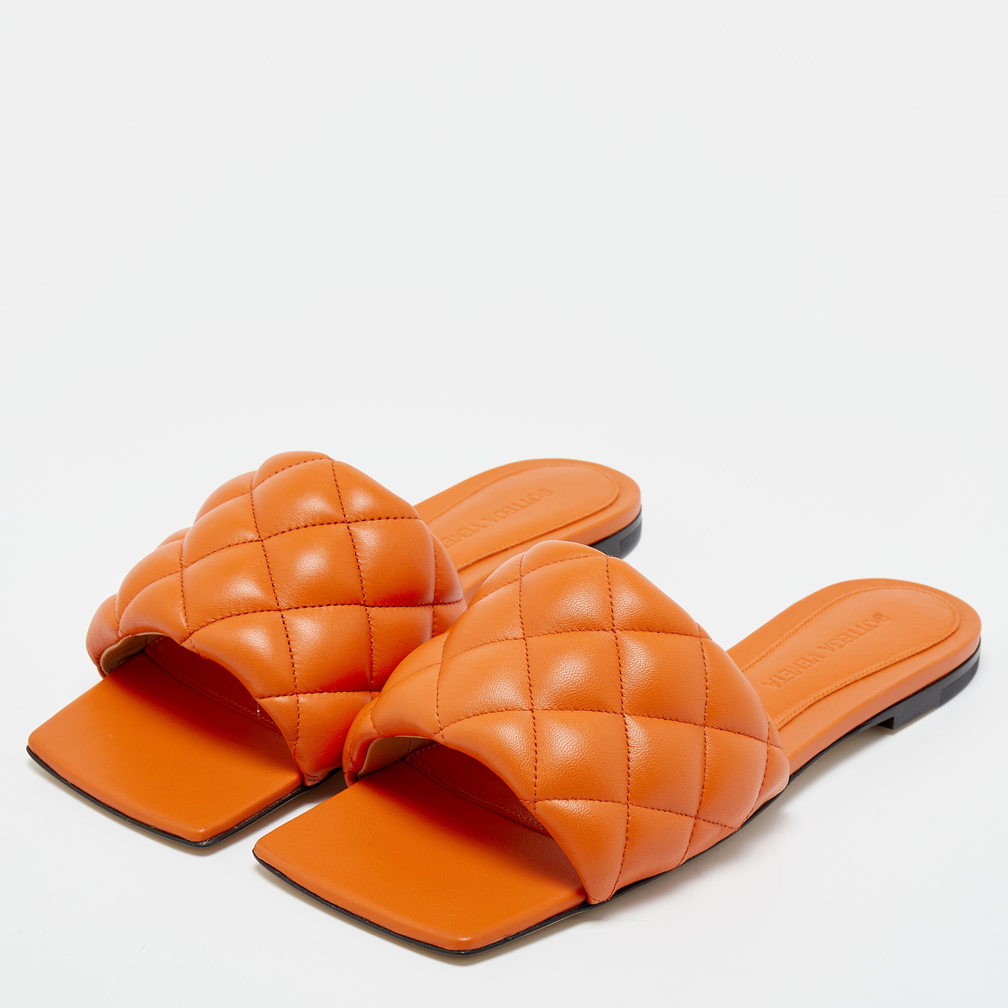 

Bottega Veneta Orange Padded Leather Flat Slides Size