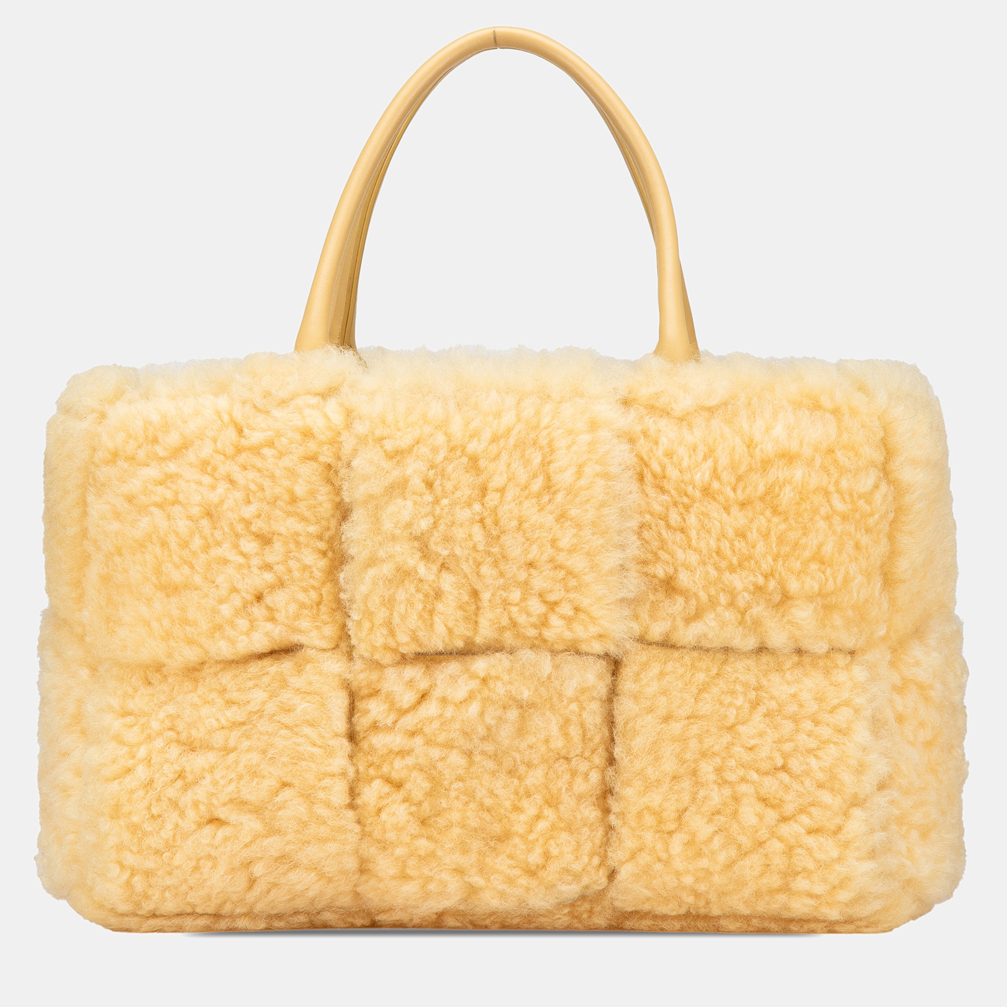 

Bottega Veneta Yellow Small Shearling Intrecciato Arco Tote