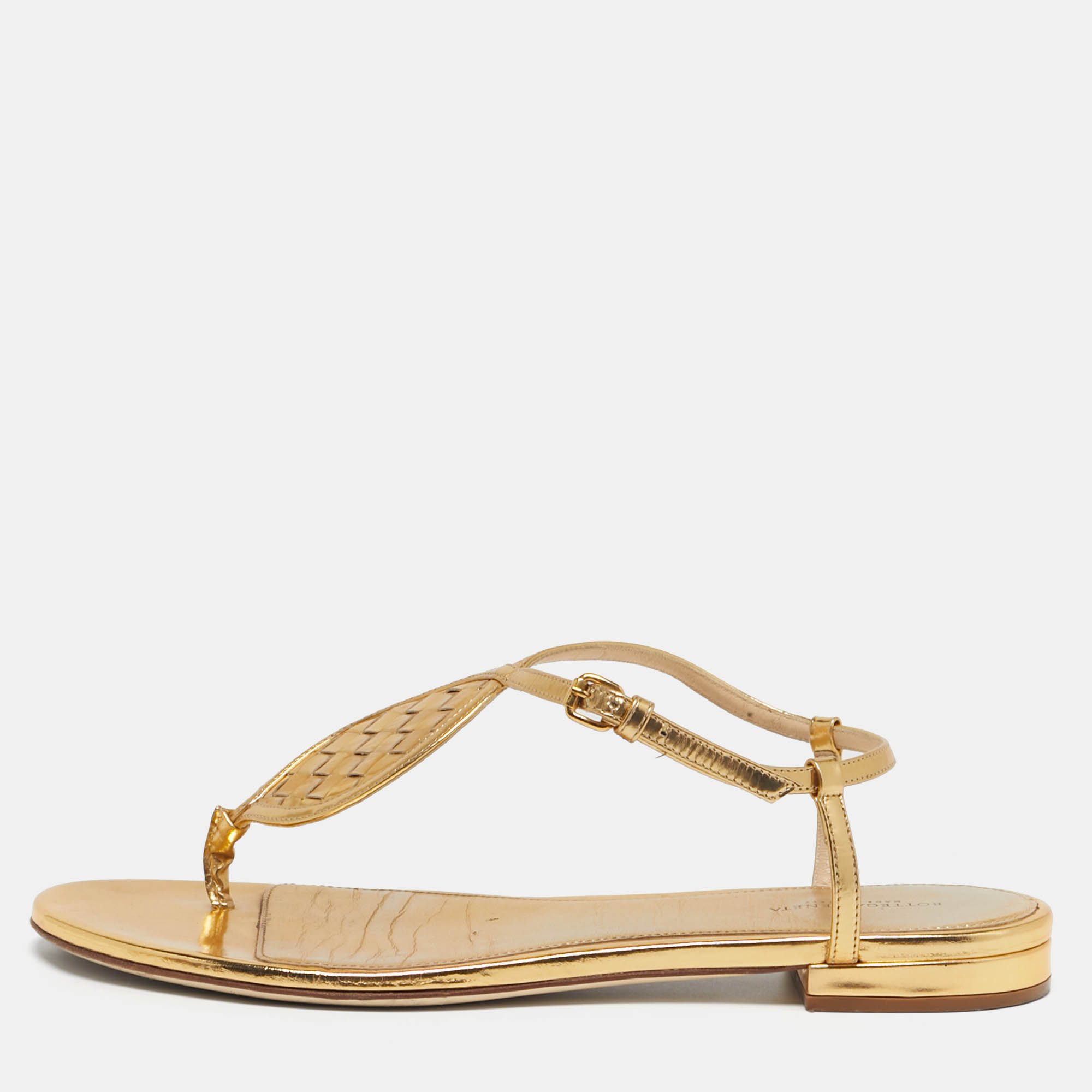 

Bottega Veneta Size  Metallic Gold Leather Ankle Strap Flat Sandals
