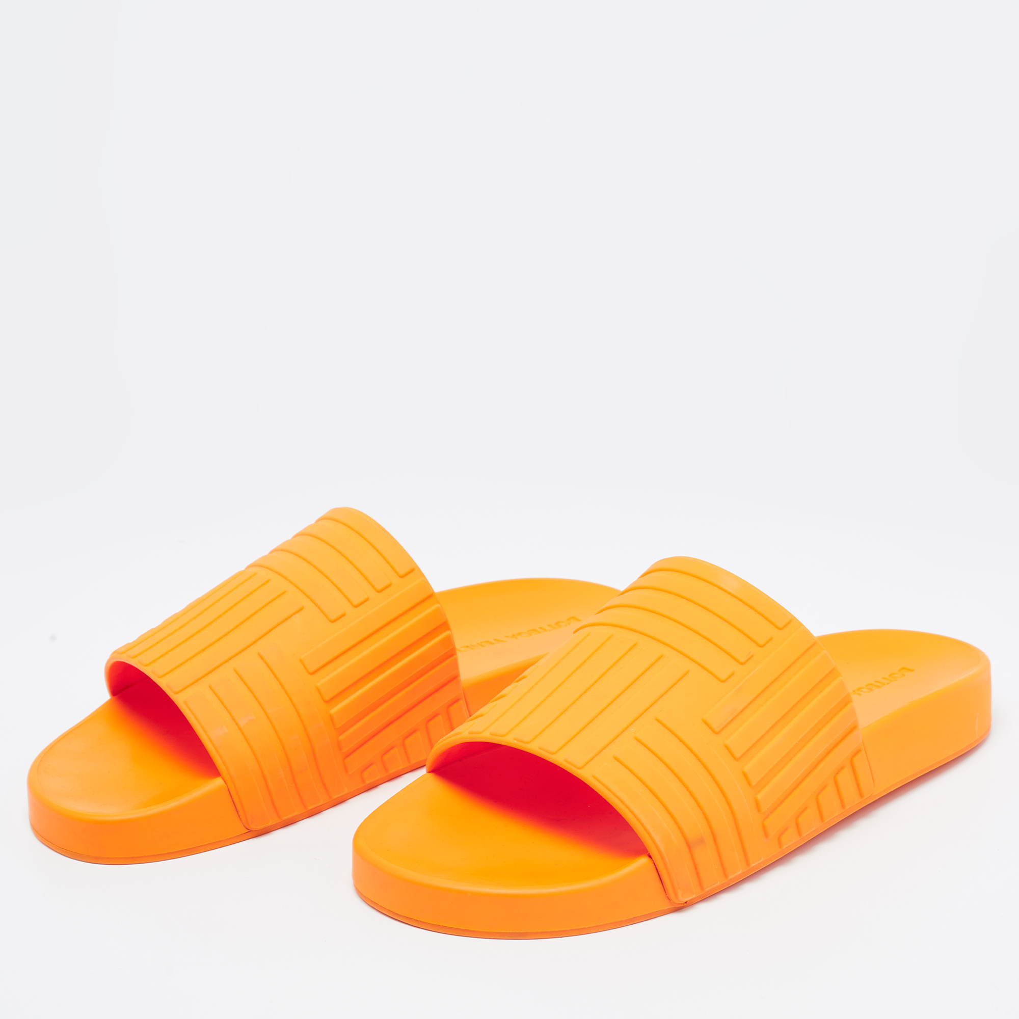 

Bottega Veneta Orange Embossed Rubber Slides Size