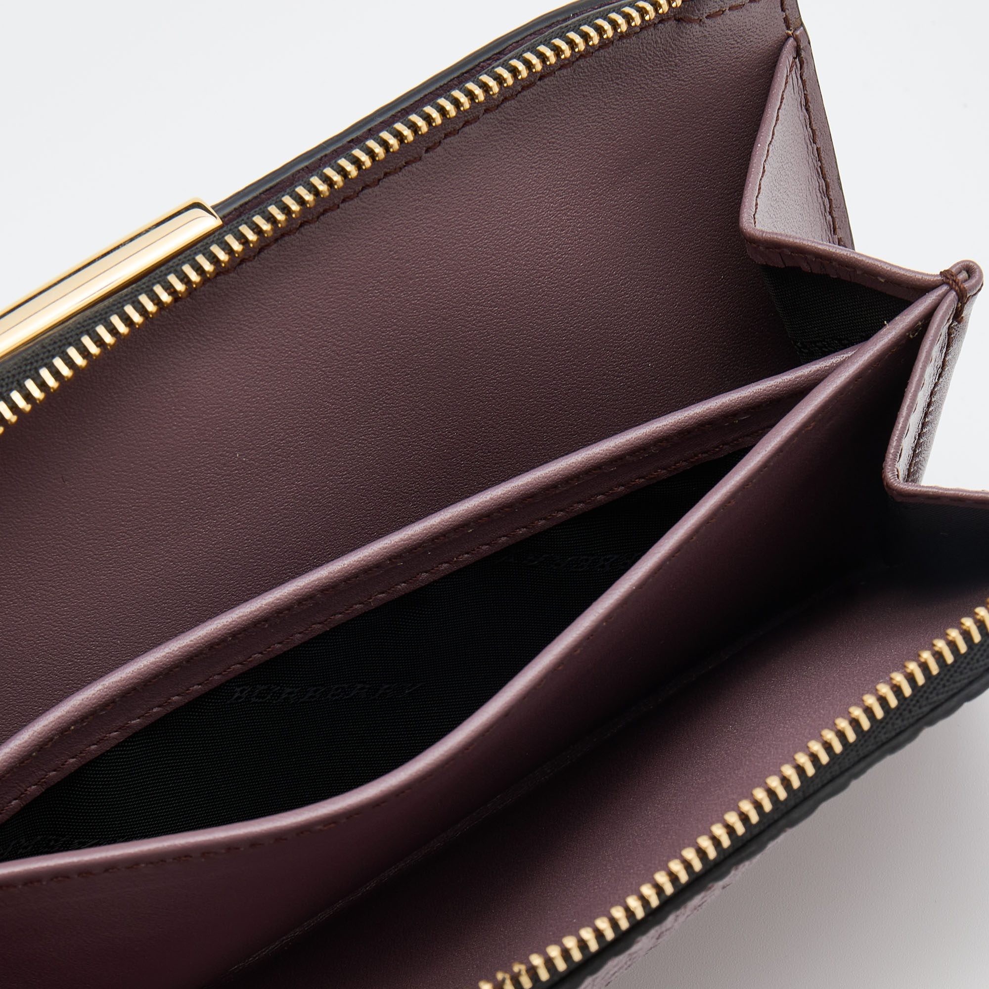 

Burberry Purple Textured Leather Zip Around Compact Wallet
