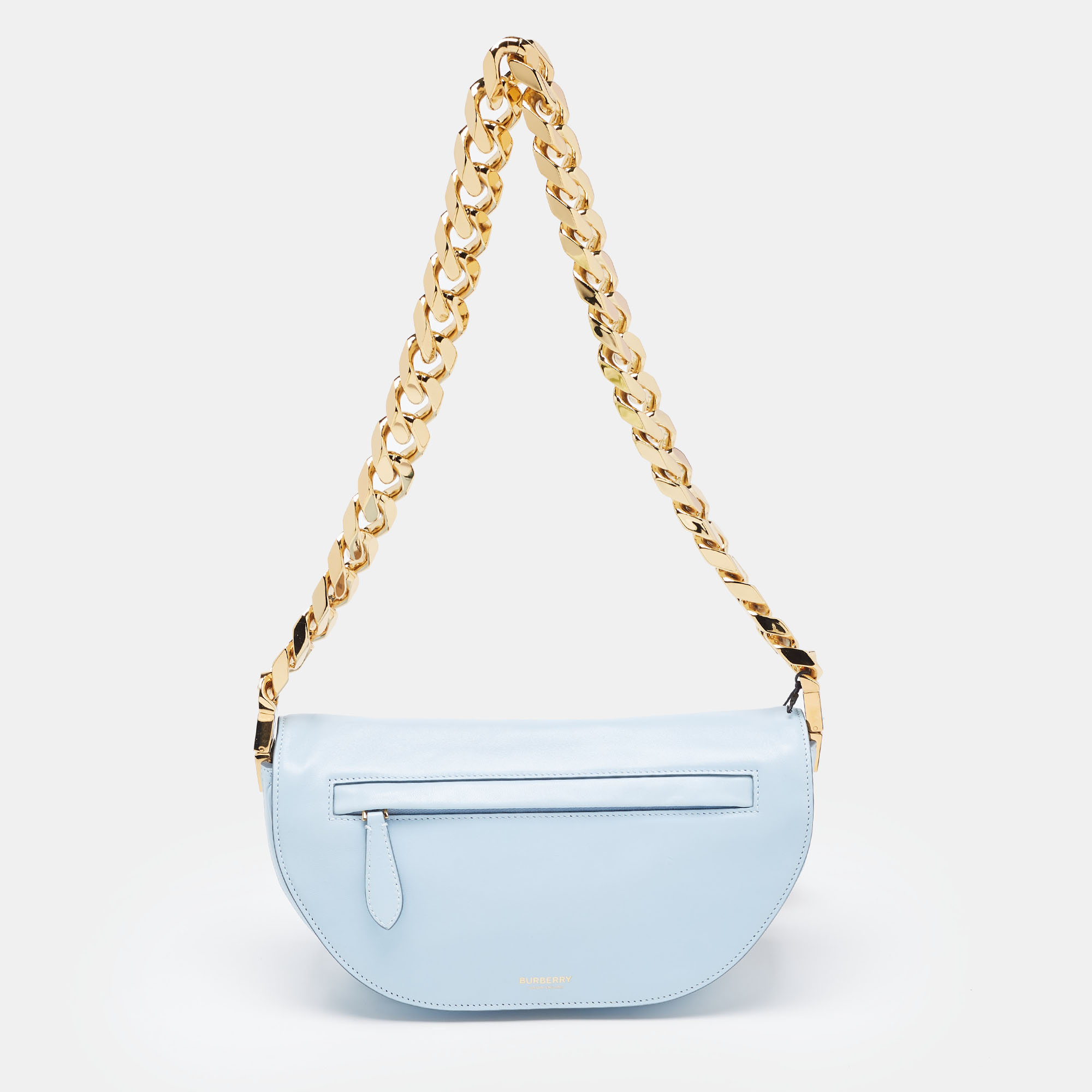 Indulge in luxury with this Burberry pale blue bag. Meticulously crafted from premium materials it combines exquisite design impeccable craftsmanship and timeless elegance. Elevate your style with this fashion accessory.