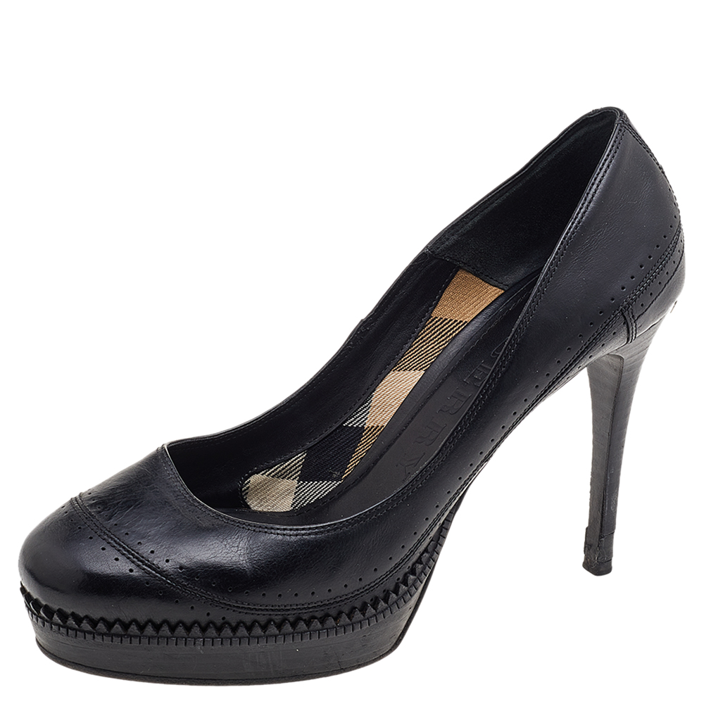 There are some shoes that stand the test of time and fashion cycles these timeless Burberry pumps are the one. Crafted from leather in a black shade they are designed with sleek cuts round toes and tall heels.