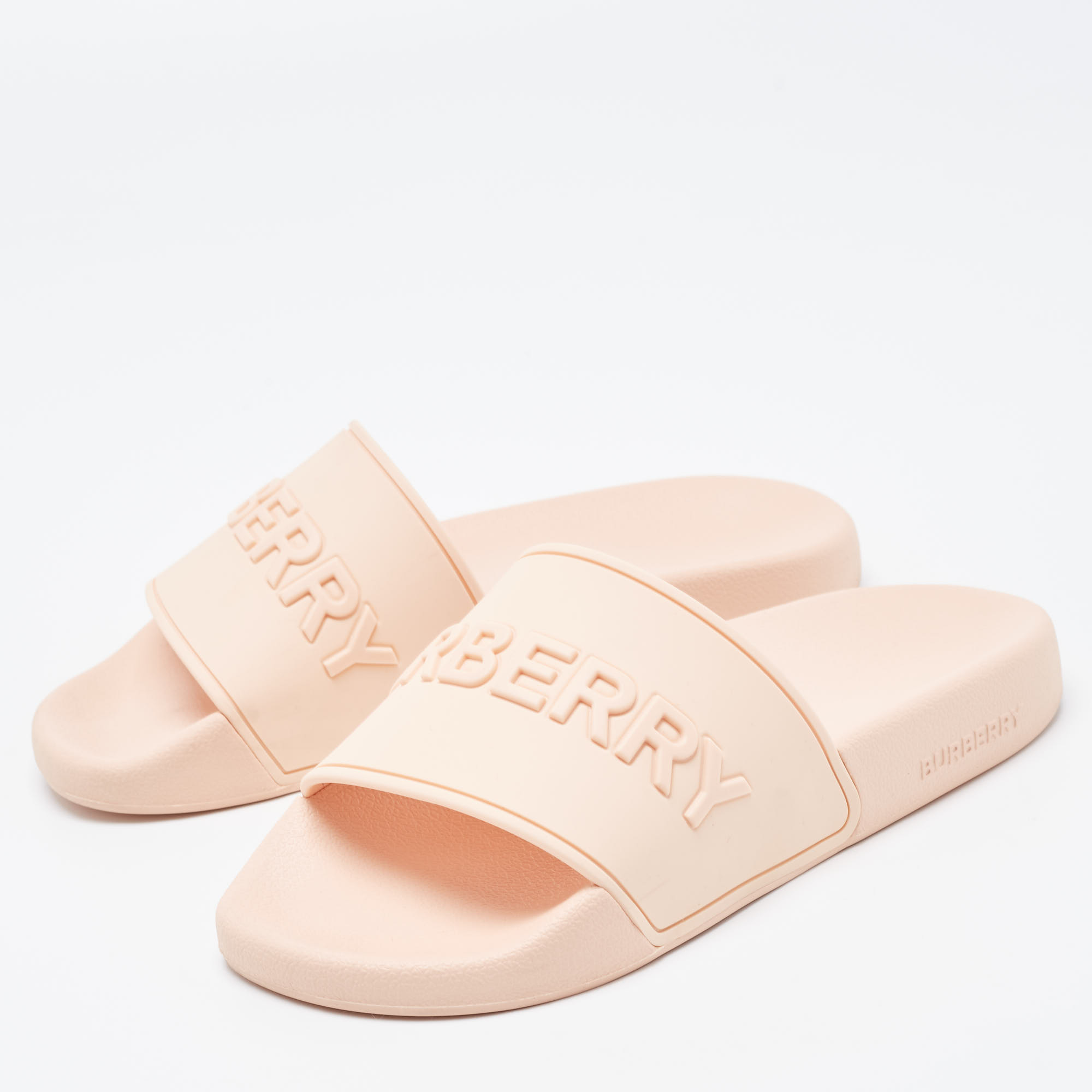 

Burberry Peach Pink Rubber Logo Embossed Flat Slides Size