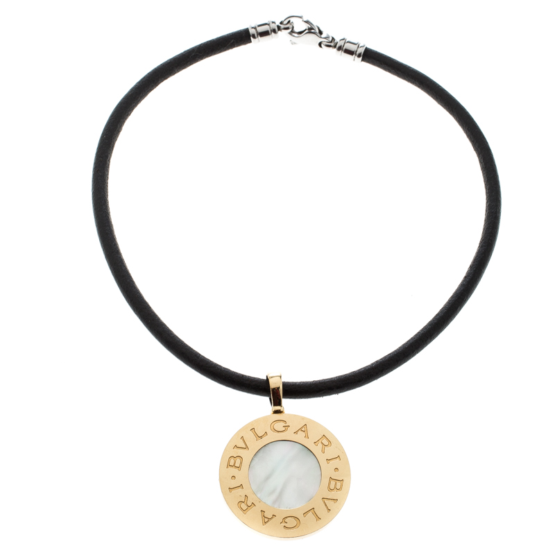 

Bvlgari Reversible 18K Yellow Gold with MOP & Steel with Onyx Pendant Leather Cord Necklace