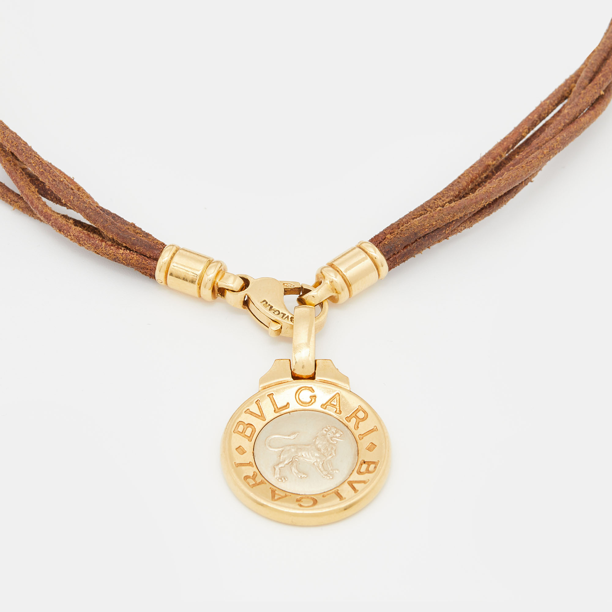

Bvlgari Zodiac 18k Two Tone Gold Leather Cord Pendant Necklace