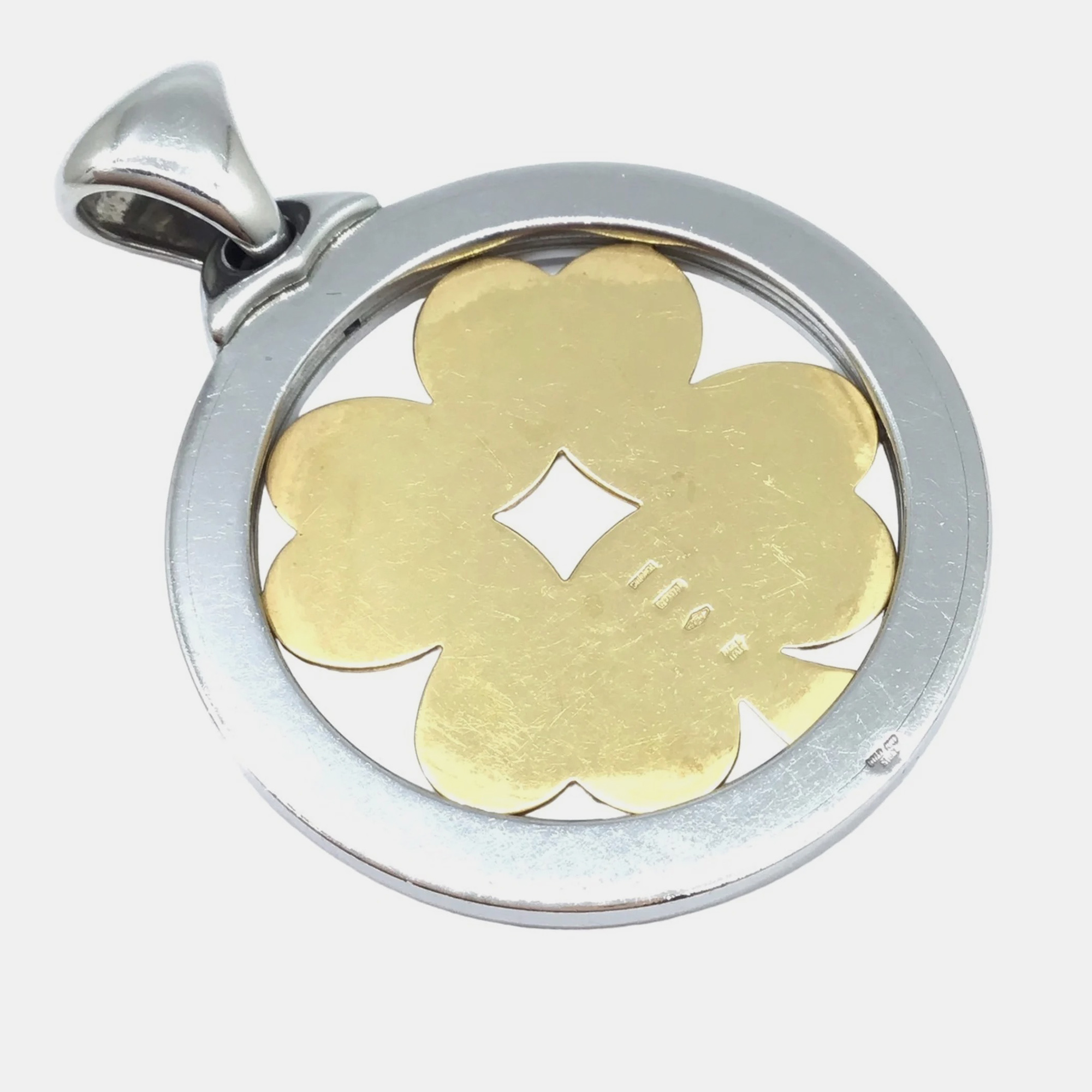 

Bvlgari 18K yellow Gold and Stainless Steel Tondo Sun Pendant