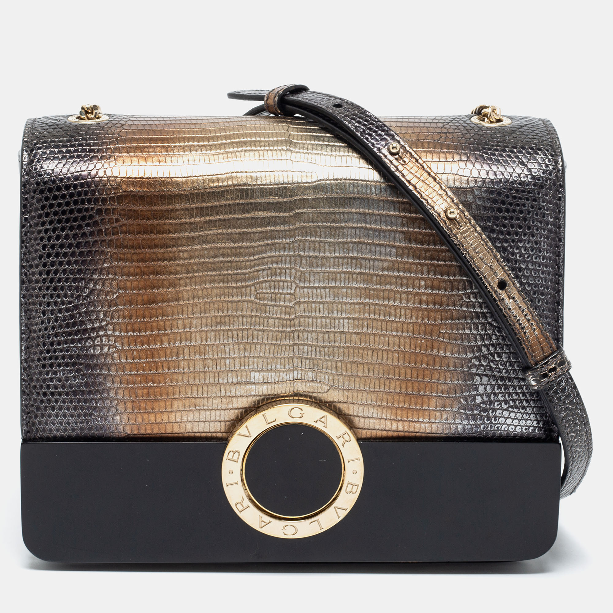 This stunning Bvlgari bag will add luxurious elegance to your style. Flawlessly crafted from lizard leather and Perspex it features a long shoulder strap and a plush leather lined interior. The branded flap closure on the front adds charm to its structured silhouette.