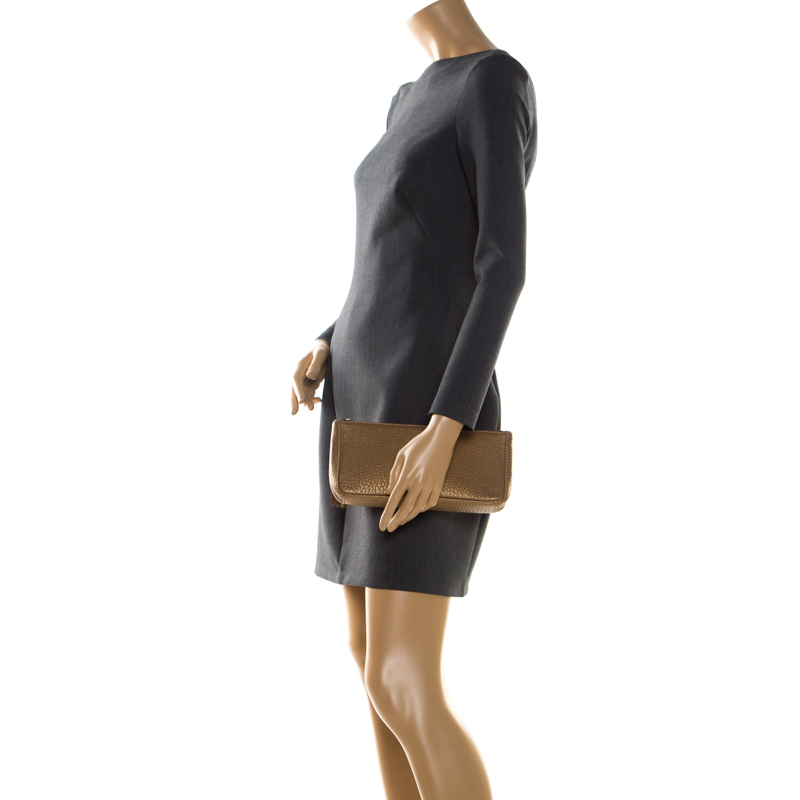 

Carolina Herrera Gold Leather Tassel Clutch