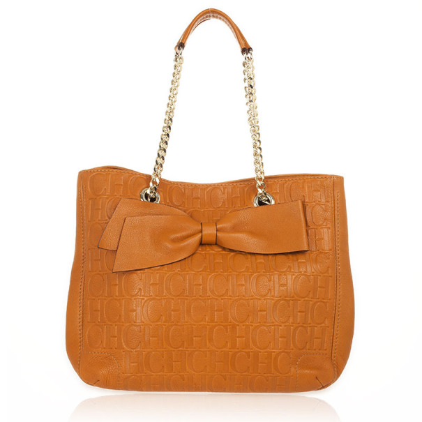 Pre Owned Carolina Herrera Orange Monogram Embossed Bow "New Anna" Tote