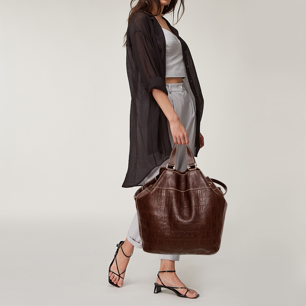 

Carolina Herrera Dark Brown Monogram Embossed Leather Drawstring Oversized Tote