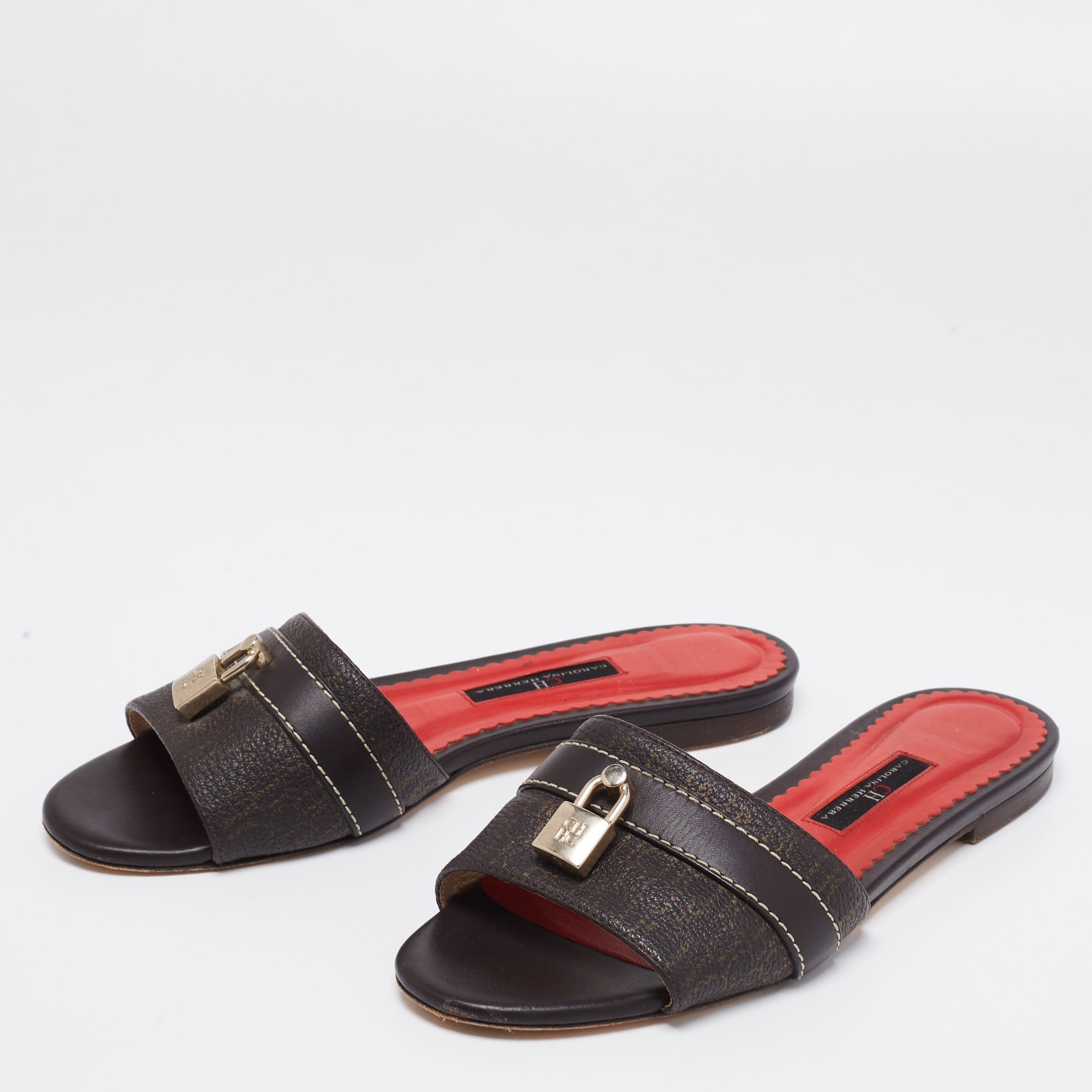 

CH Carolina Herrera Brown Signature Leather Lock Flat Slides Size