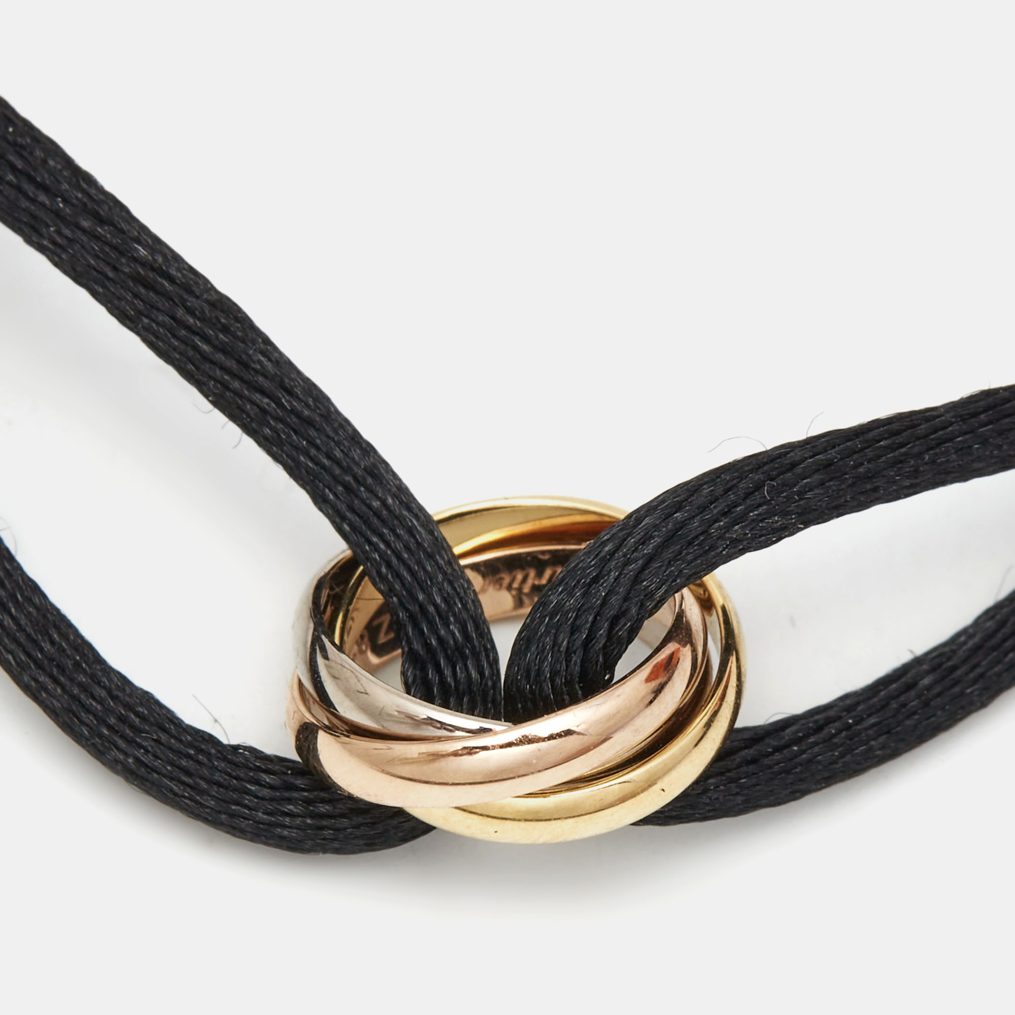 

Cartier Trinity 18k Three Tone Gold Adjustable Cord Bracelet