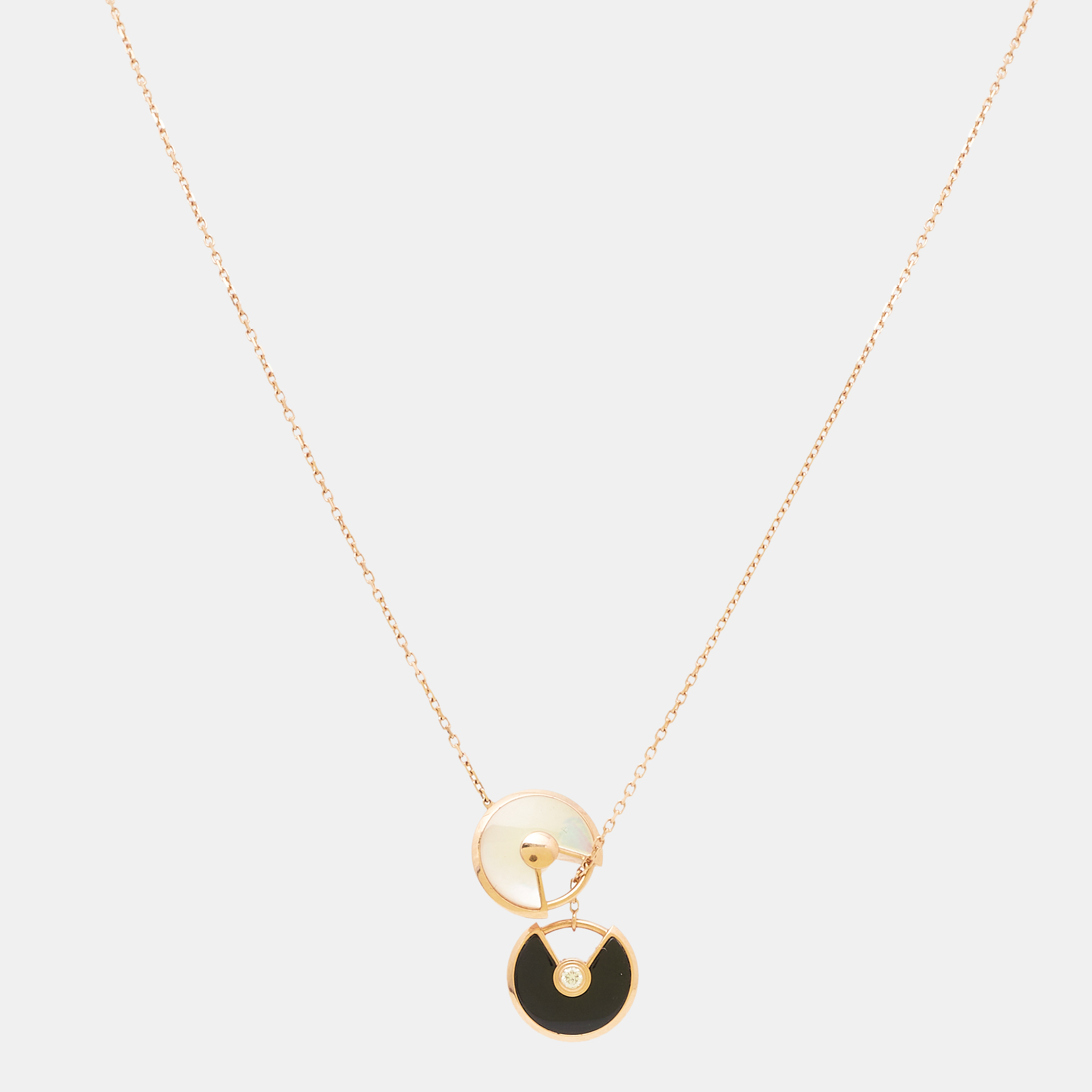 

Cartier Amulette de Cartier Mother of Pearl Onyx Diamond 18k Rose Gold  Motif Necklace