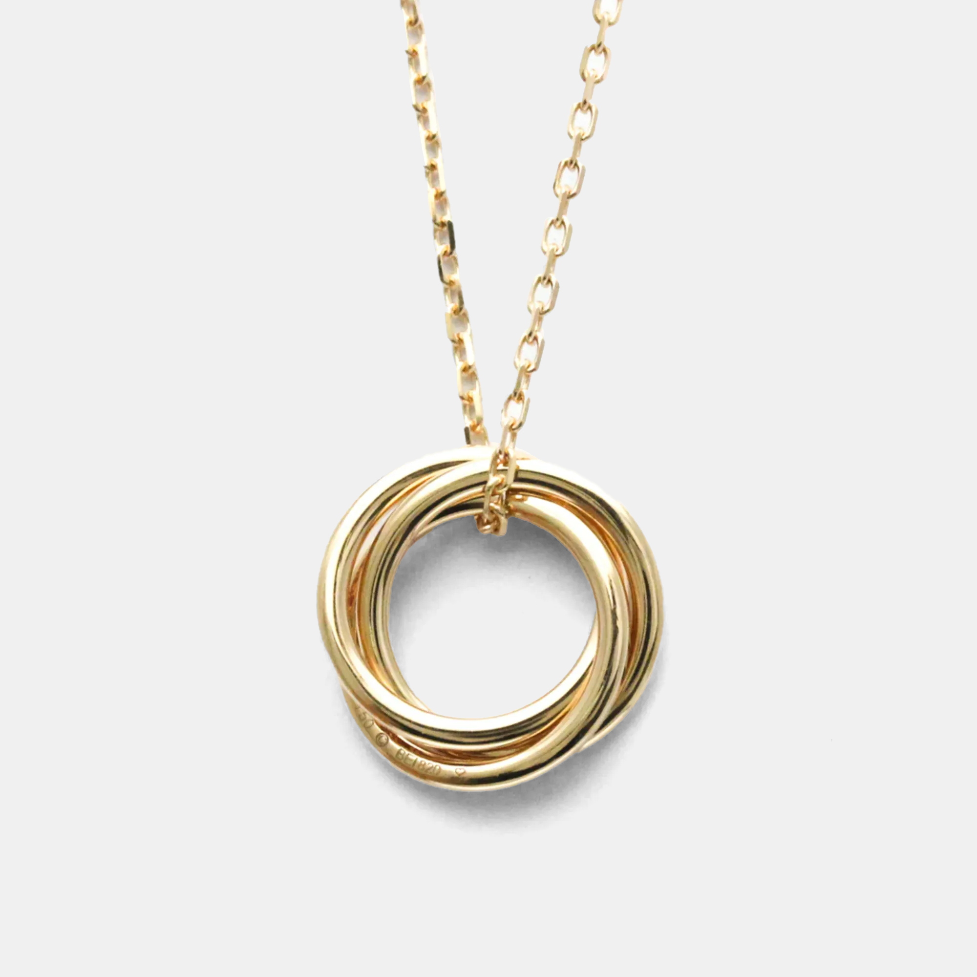 

Cartier Trinity 18K Yellow, Rose, White Gold and Pink Sapphire Pendant Necklace