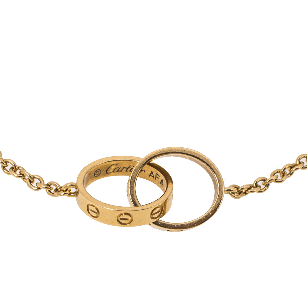 

Cartier Love Interlocking Screw Motif 18K Yellow Gold Bracelet