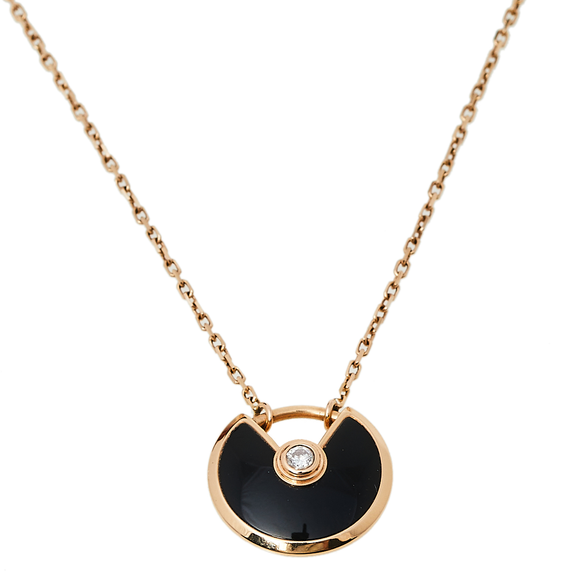 

Cartier Amulette De Cartier Onyx Diamond 18K Rose Gold Pendant Necklace