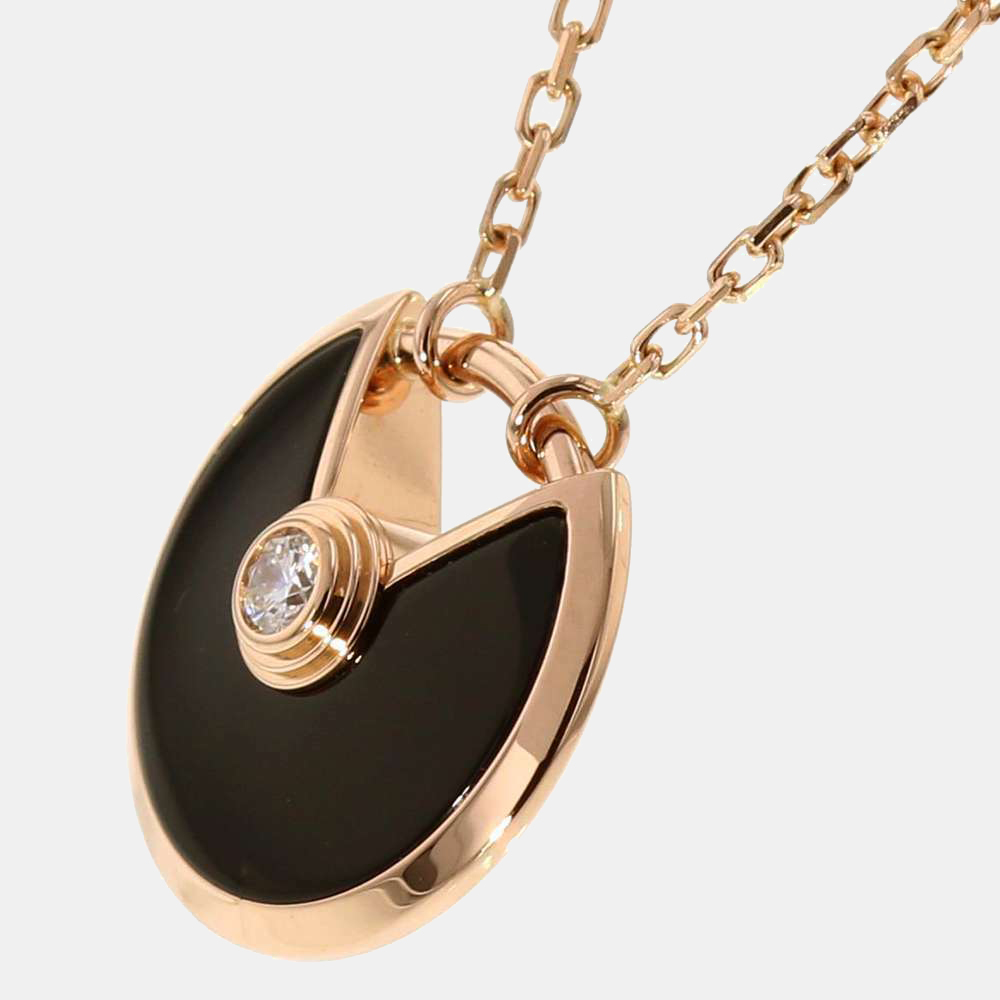 

Cartier Amulette De Cartier  18K Rose Gold Diamond and Onyx Necklace