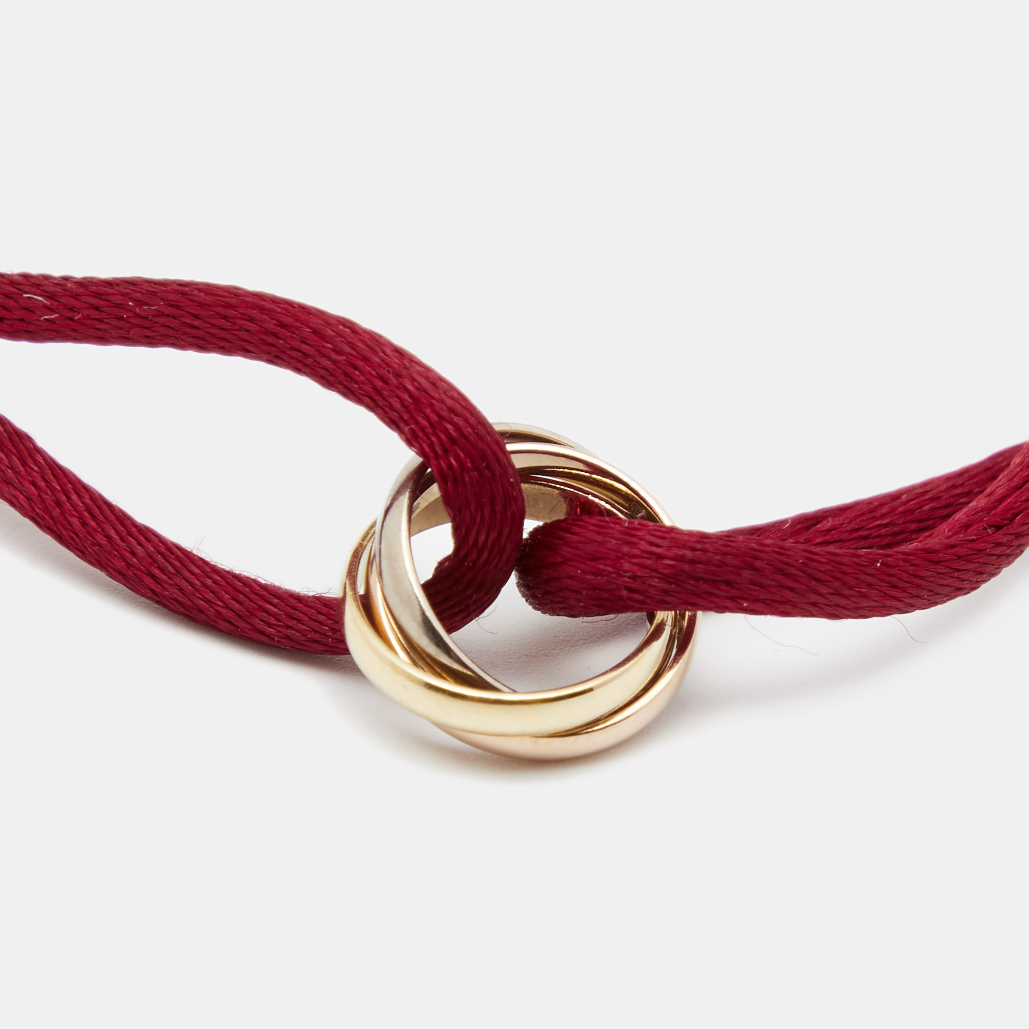 

Cartier Trinity 18k Three Tone Gold Red Adjustable Cord Bracelet