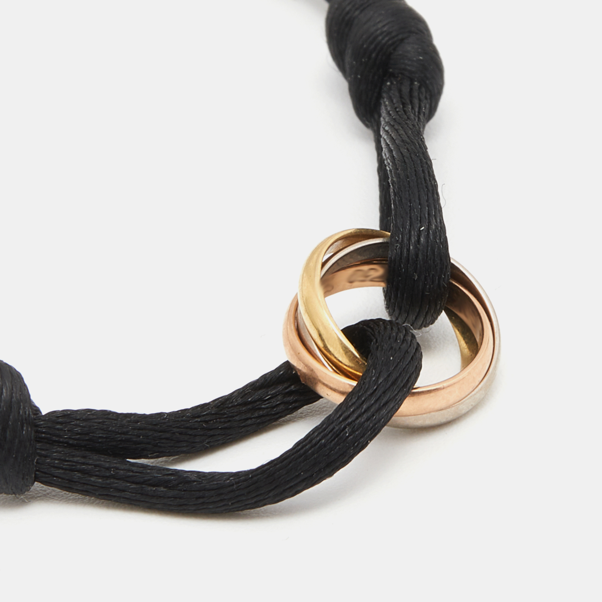 

Cartier Trinity 18k Three Tone Gold Adjustable Black Cord Bracelet