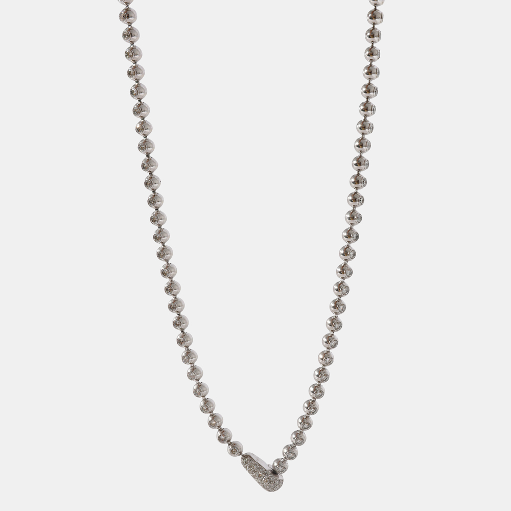The house of Cartier brings you this absolutely iconic and epically designed necklace that will charm those around you for years to come. It has a pearl linked 18k white gold chain with no pendant. This necklace is subtly sophisticated and can stand out when worn with muted and dark toned outfits.