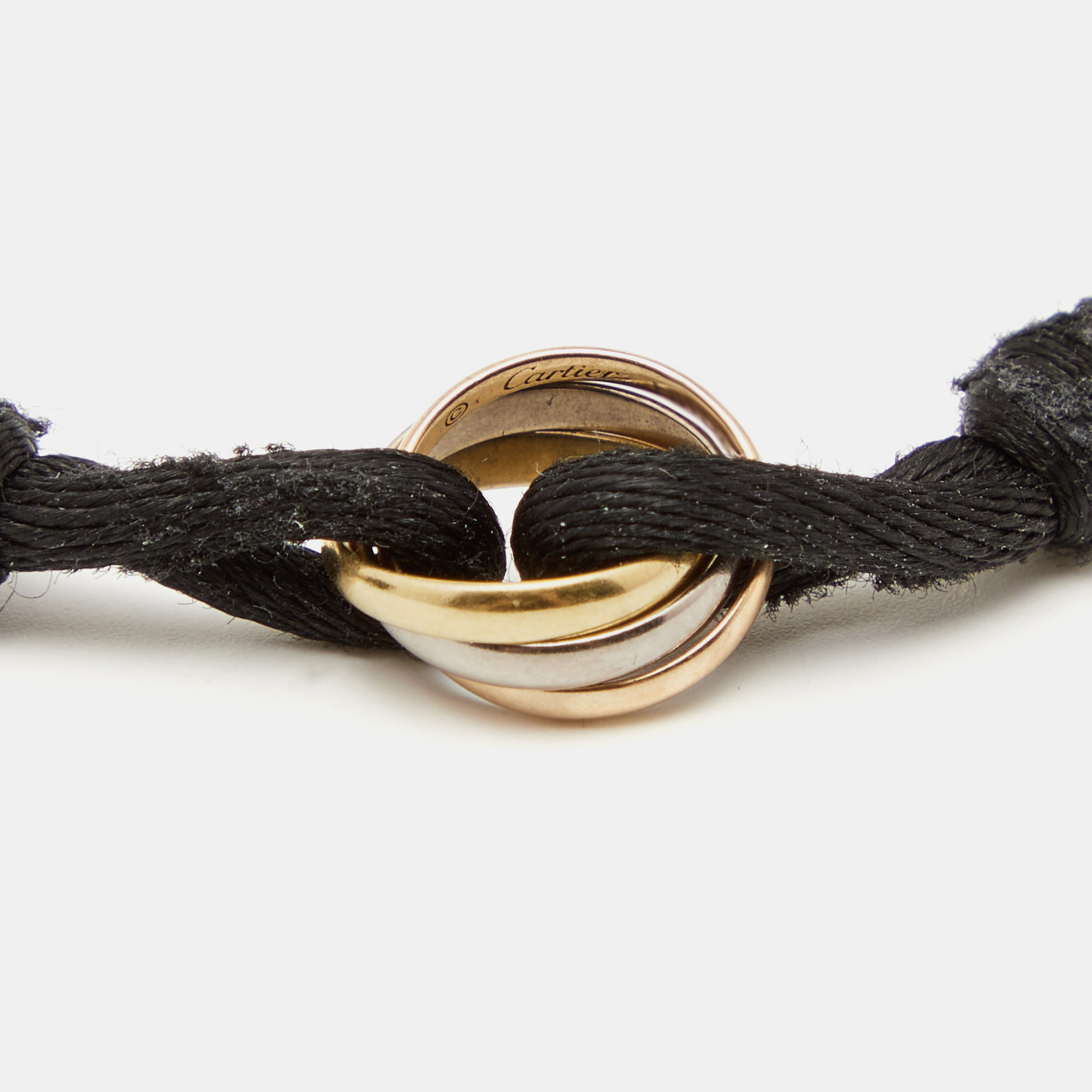 

Cartier Trinity 18k Three Tone Gold Adjustable Black Cord Bracelet
