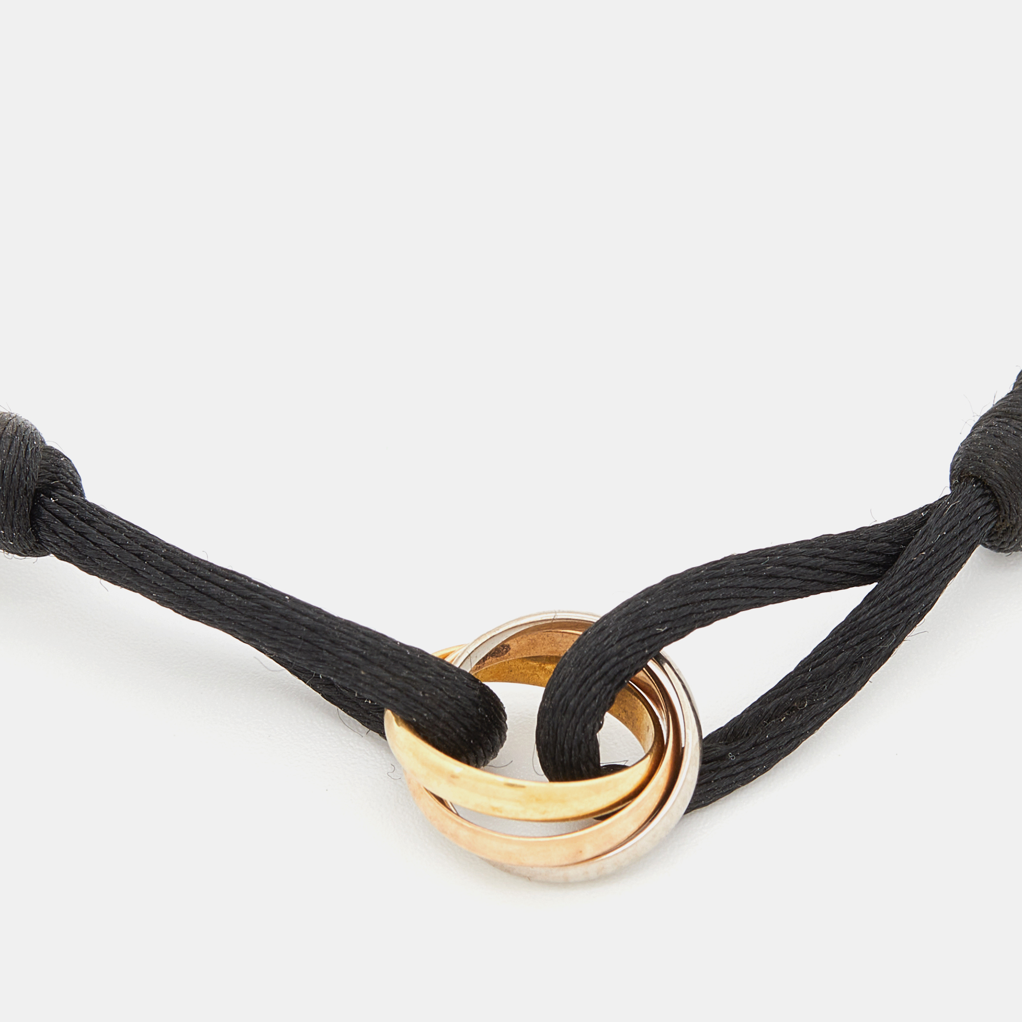 

Cartier Trinity 18k Three Tone Gold Adjustable Cord Bracelet
