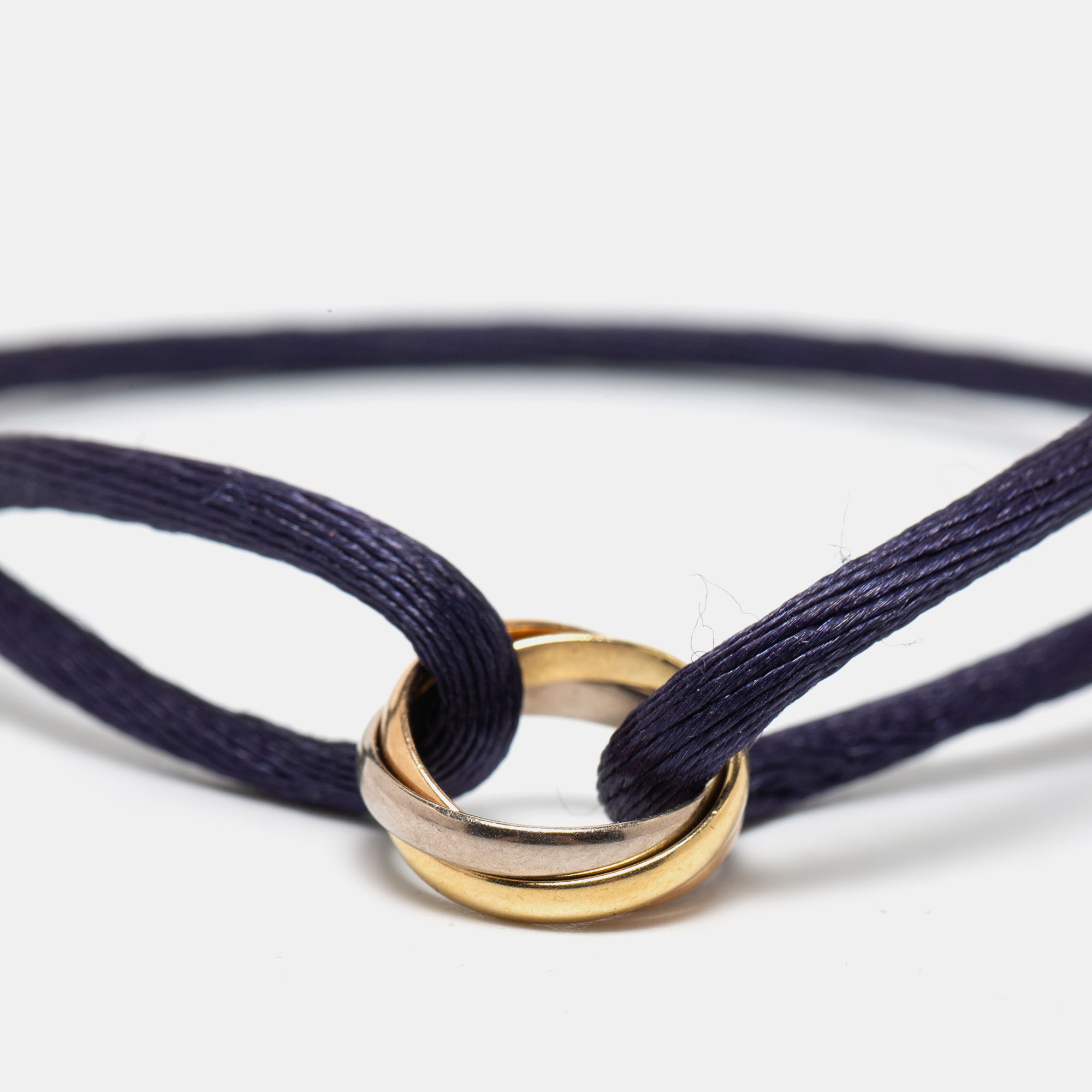 

Cartier Trinity 18k Three Tone Gold Adjustable Cord Bracelet