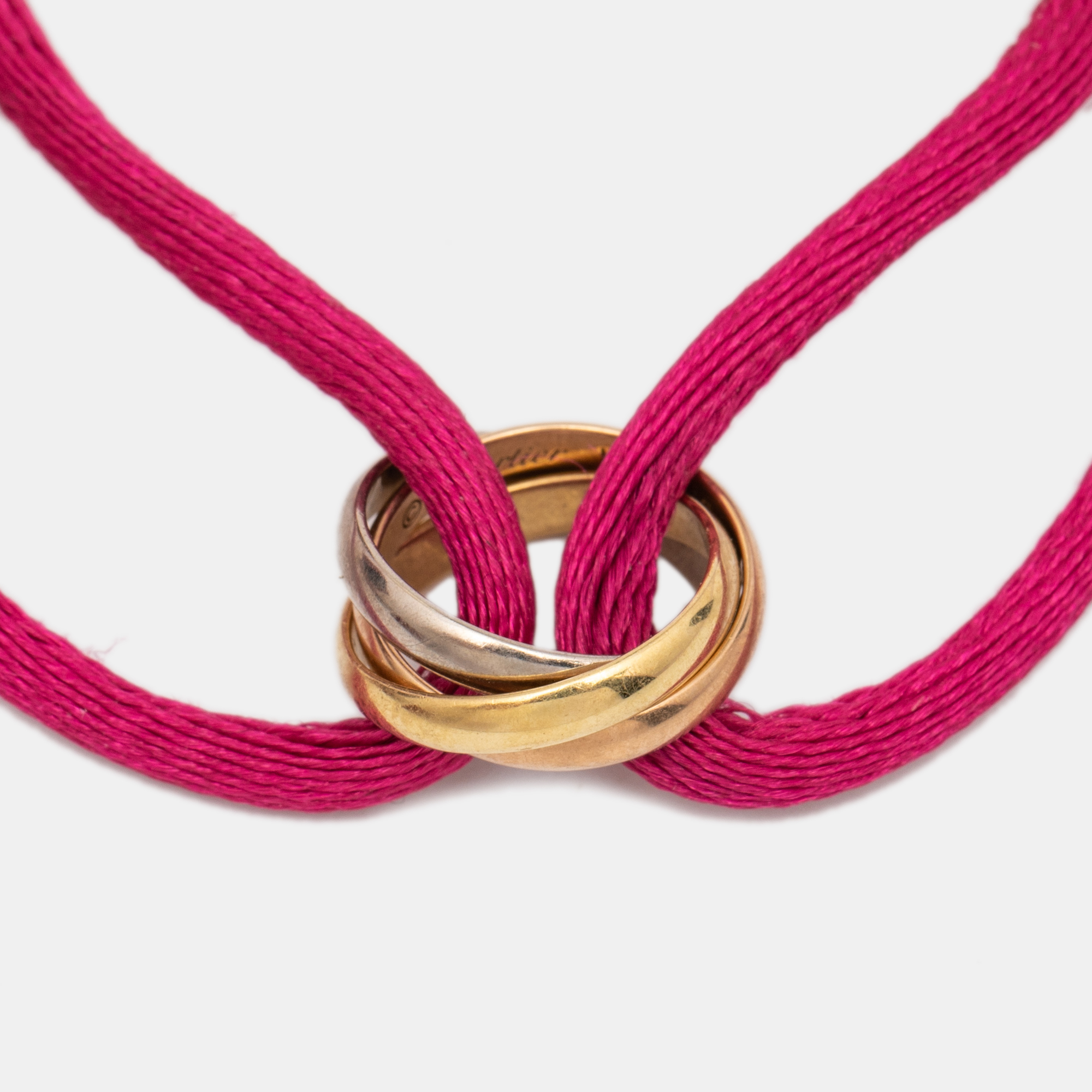 

Cartier Trinity 18k Three Tone Gold Adjustable Cord Bracelet