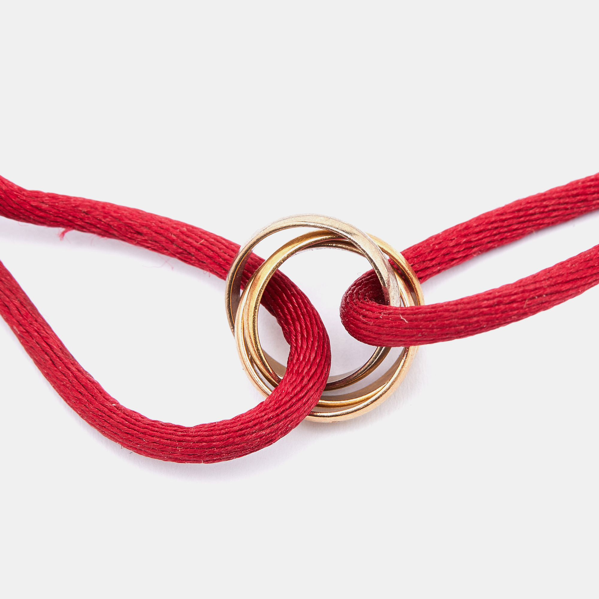 

Cartier Trinity 18k Three Tone Gold Adjustable Cord Bracelet