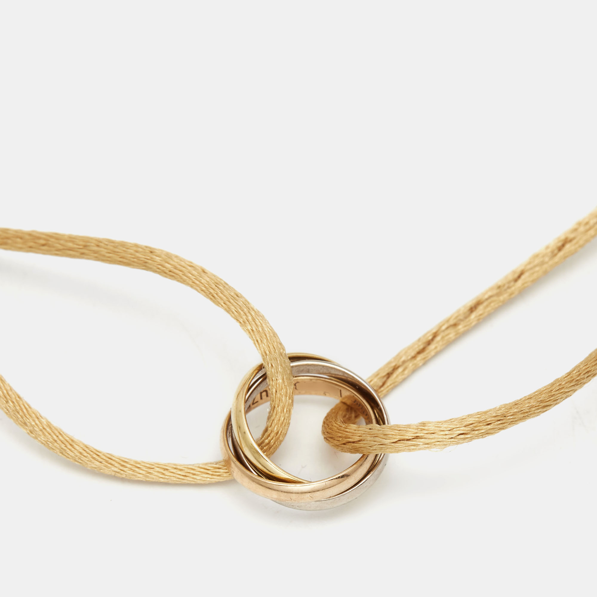 

Cartier Trinity 18k Three Tone Gold Adjustable Cord Bracelet