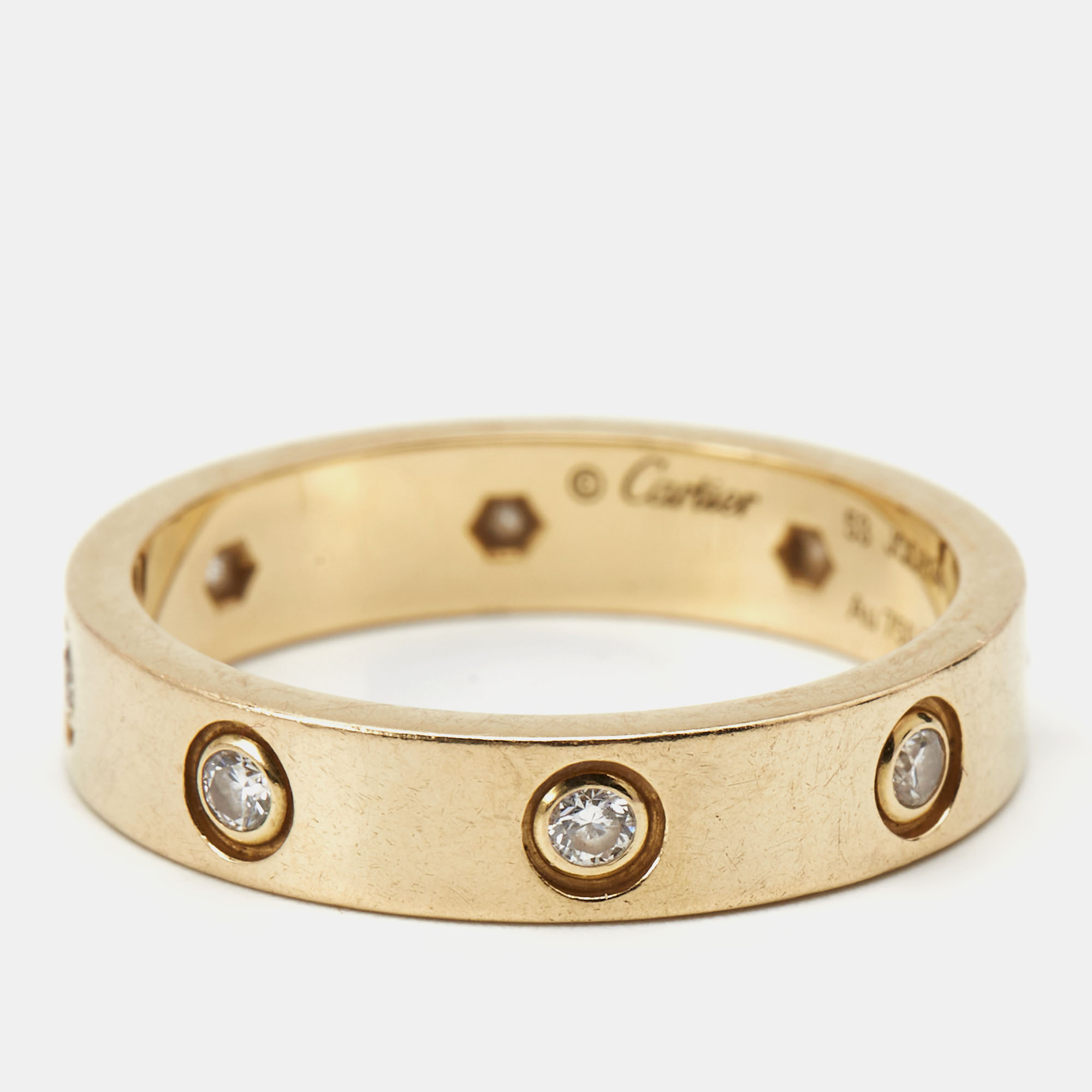 

Cartier Love 8 Diamond 18k Yellow Gold Band Ring Size