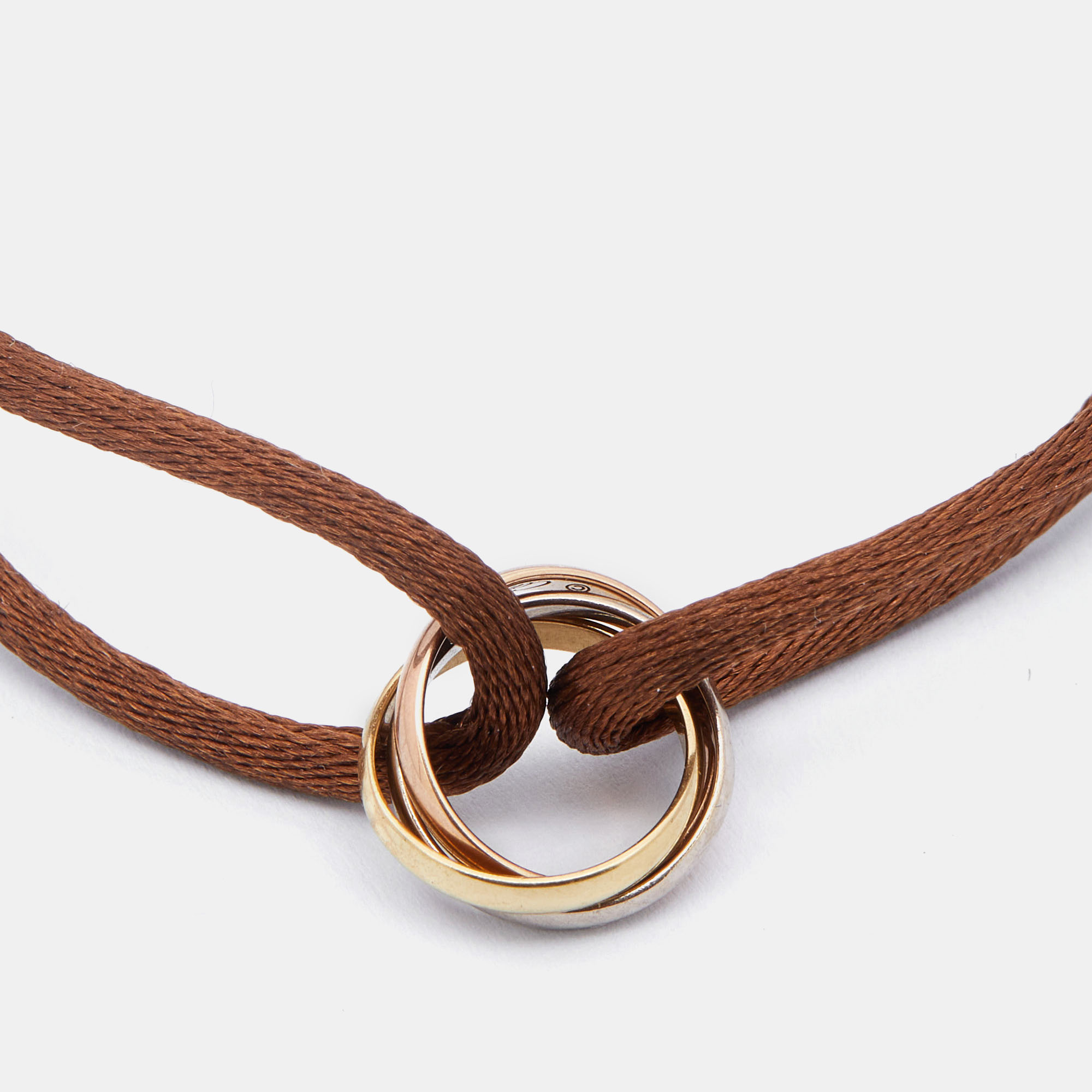 

Cartier Trinity de Cartier 18K Three Tone Gold Adjustable Brown Cord Bracelet