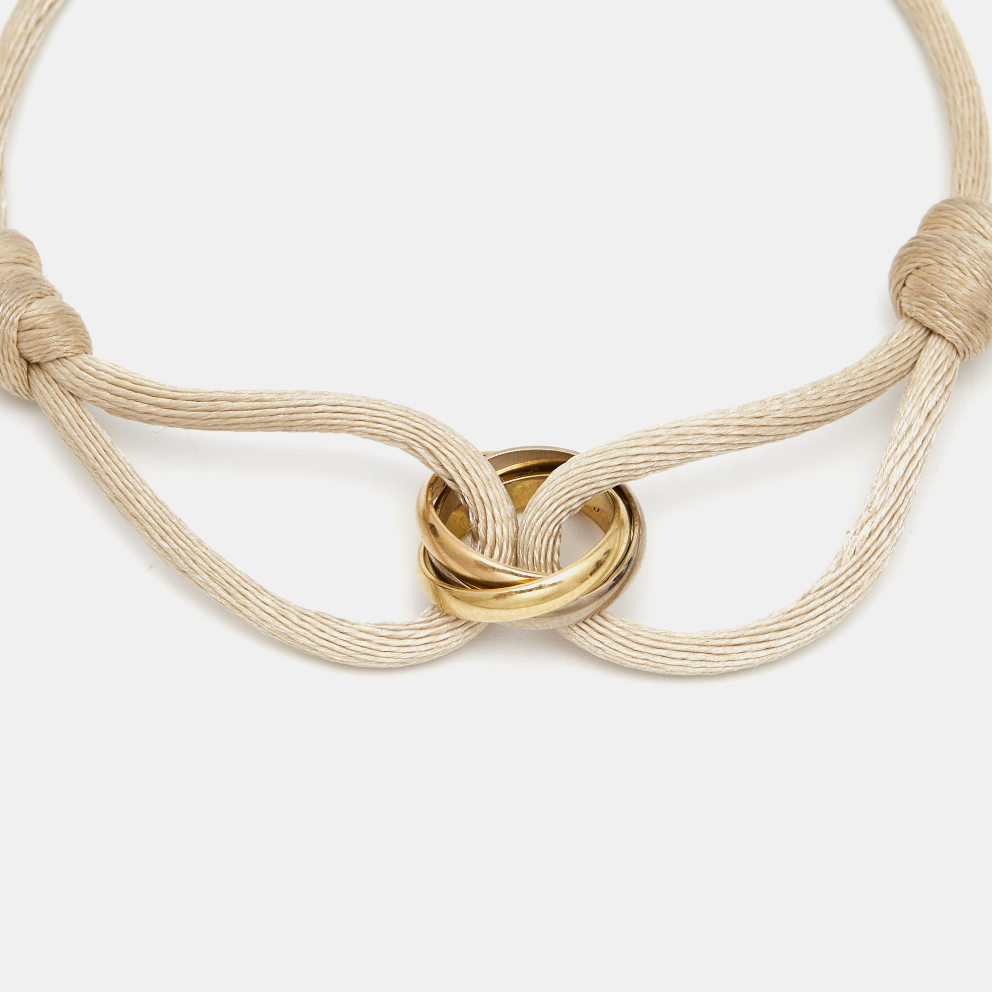 

Cartier Trinity 18k Three Tone Gold Adjustable Cord Bracelet
