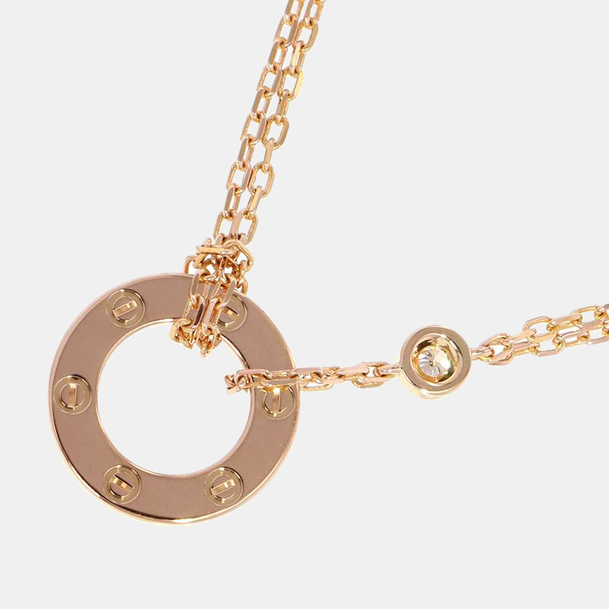 

Cartier Love 18K Rose Gold Diamond Sapphire Necklace