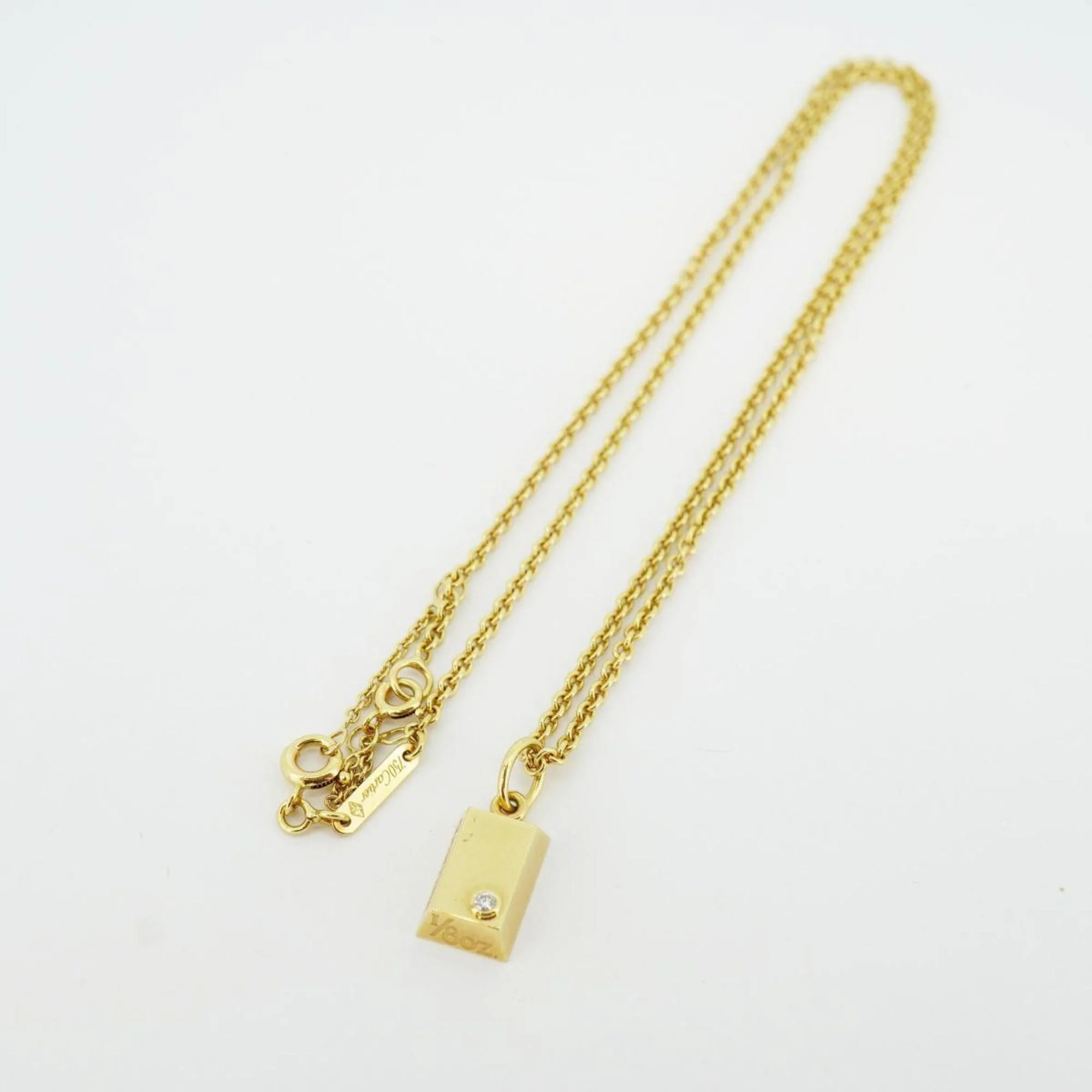 

Cartier 18K Yellow Gold and Diamond Oz Ingot Bar Pendant Necklace