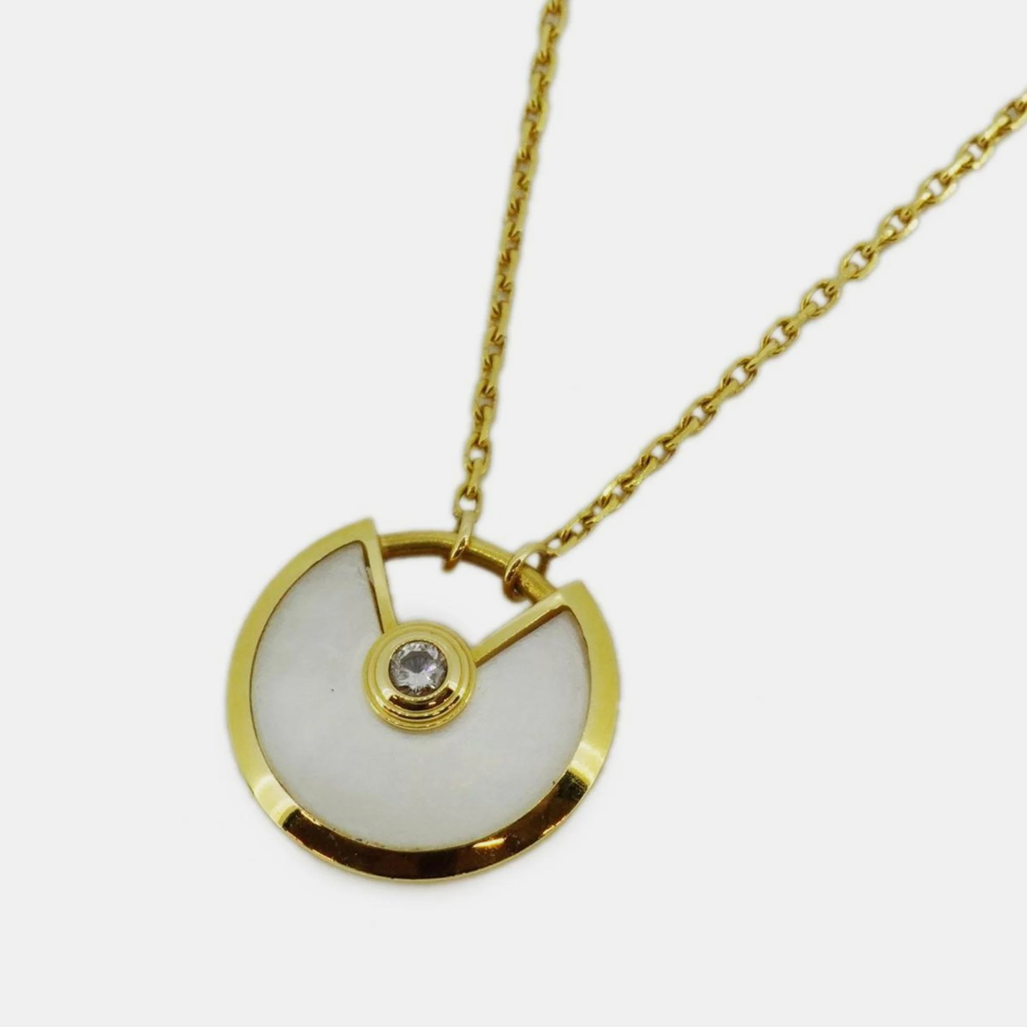 

Cartier 18K Yellow Gold, Diamond and Mother of Pearl Amulette De Cartier Pendant Necklaces