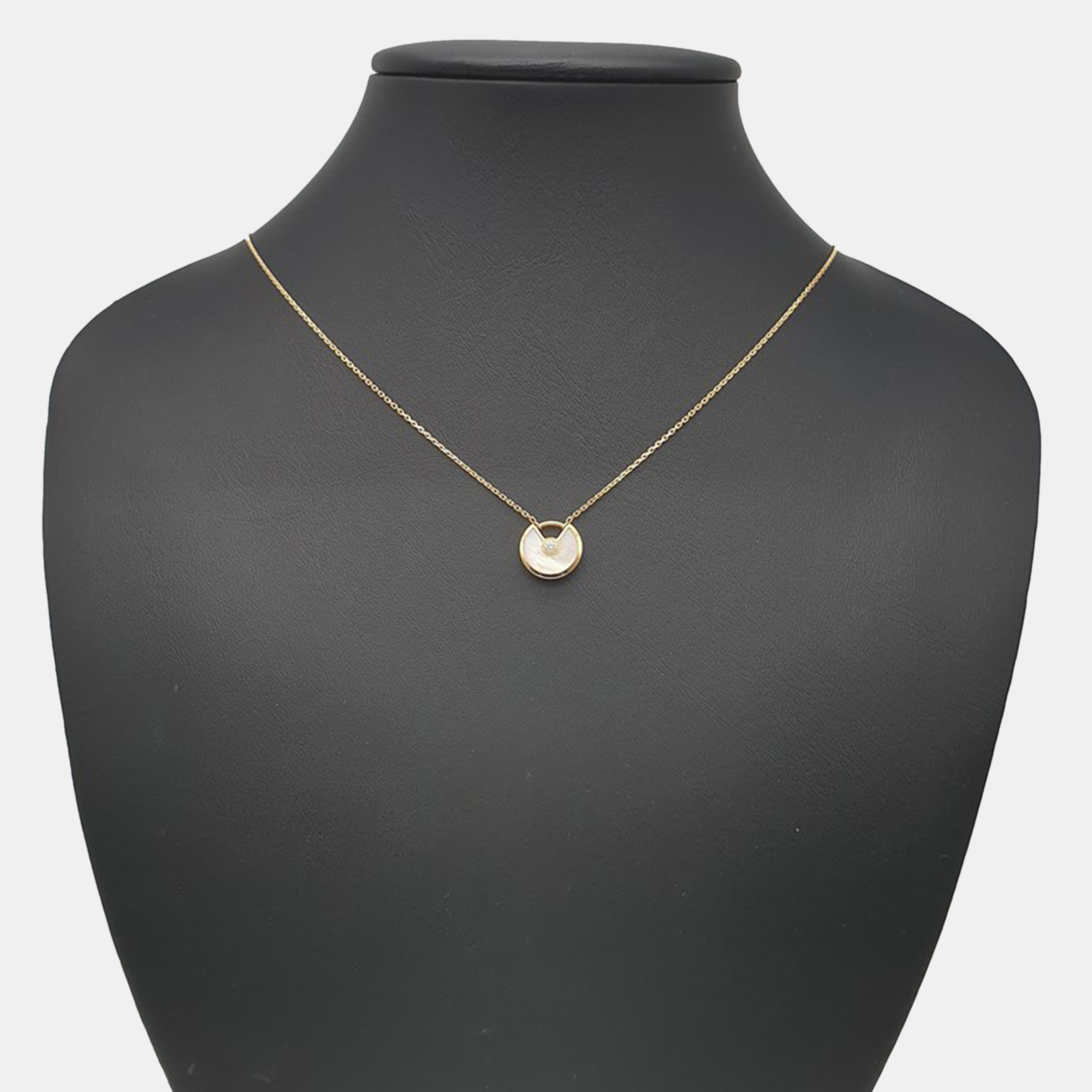 

Cartier 18K Yellow Gold, Diamond, Mother of Pearl Amulette De Cartier Pendant Necklace